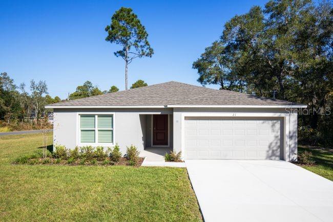 Pre-Construction. To be built. The Violet in Spring Hill enjoys added privacy and presence within a vibrant, established neighborhood framed by mature trees, manicured landscaping, and a true sense of community. Convenient access to the Veterans Expressway and US-19 connects you easily to Downtown Tampa, Clearwater, and St. Petersburg, while the Suncoast Parkway provides a smooth route north toward Homosassa and US-98, making regional travel simple and stress-free. The Violet blends modern convenience with timeless design, creating a home that feels both comfortable and intentional. A welcoming foyer introduces a thoughtfully planned split-bedroom layout, with two generously sized secondary bedrooms positioned just off the entry, separated by a full bath and complemented by a conveniently located linen closet. At the heart of the home, the open-concept kitchen anchors daily living with quartz countertops, a spacious island, pantry, and a full line of kitchen appliances, including an ENERGY STAR® side-by-side refrigerator. The kitchen flows seamlessly into the bright Great Room and dining nook, where luxury vinyl flooring defines the main living areas and creates a durable, cohesive space ideal for everyday living and entertaining. Privately tucked away, the owner’s suite serves as a relaxing retreat with a walk-in closet, ensuite dual vanities, and a walk-in shower designed for comfort and ease. The secondary bedrooms also feature soft carpeting, adding warmth throughout the private living spaces. All bedrooms have carpet for comfort. A centrally located laundry room with washer & dryer includes plus  its own linen closet adds practicality without interrupting the home’s natural flow. Just beyond the main living area, the rear patio extends the home outdoors, providing an inviting setting for quiet mornings, evening relaxation, or casual gatherings. Additional highlights include a Smart Home Package featuring a Ring Video Doorbell, smart thermostat, keyless entry, and Deako switches, along with architectural shingles, irrigation, professional landscaping, and a two-car garage for parking and storage. Backed by a full builder warranty, The Violet combines thoughtful design, corner-lot appeal, and effortless living in a setting that truly feels like home. Schedule your private tour today. We can’t wait to welcome you home!