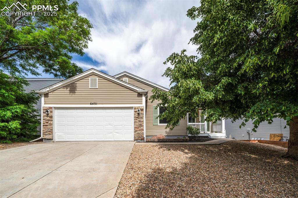 Charming ranch-style home conveniently located near the Powers Corridor, offering easy access to shopping, dining, and more. This 2-bedroom, 2-bathroom home features an open main level with fresh interior paint and all new Andersen windows, plus new Andersen sliding glass doors on both levels. Step out onto the back deck to enjoy sweeping views to the east.

The full walkout basement is partially finished—framed and wired for an additional bedroom, bathroom, and spacious family room—offering a fantastic opportunity to expand your living space. Both bathrooms have updated lighting and mirrors, and new blinds throughout the home will stay.

Tech upgrades include a smart thermostat, smart garage door, and smart entry doors. Dedicated Metronet fiber optic internet is ready to go for lightning-fast connectivity. This move-in-ready home is waiting for your finishing touches!