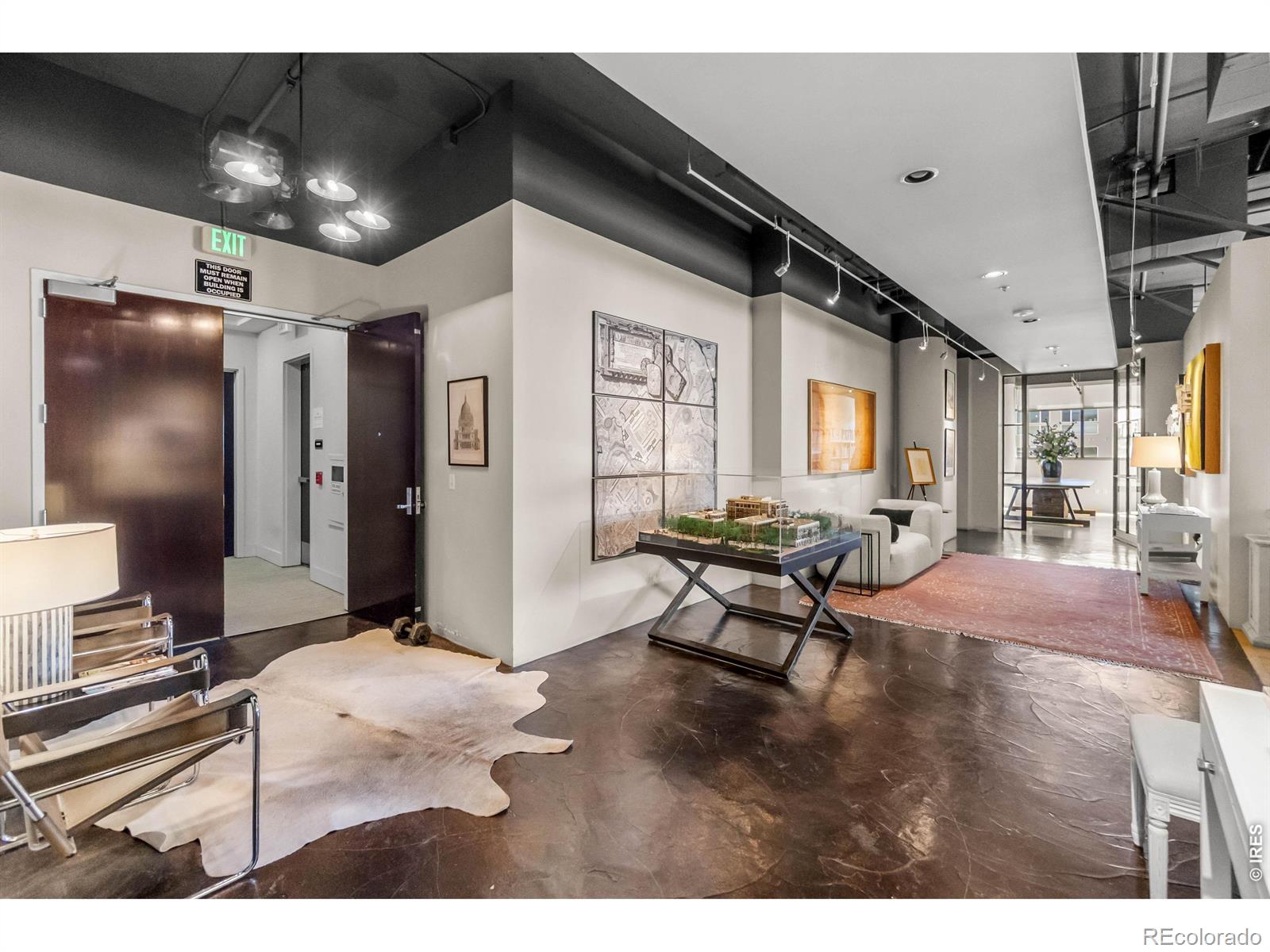 An exceptional and rare opportunity to own a premier penthouse in the heart of Uptown Denver. Situated on 450 E 17th this expansive 4,000 square foot corner penthouse offers unmatched flexibility with C-MX-8 zoning-ideal for luxury residential living, a sophisticated live/work environment, or boutique office use. Designed by acclaimed architect Don Ruggles, the thoughtfully designed office is easily adaptable to a stunning private residence while maintaining the integrity of its architectural roots. Incredible windows flood the space with natural light and frame breathtaking cityscape views from every angle. The corner penthouse positioning delivers spectacular sunsets, dynamic urban vistas, and a sense of elevation that is both inspiring and refined. An incredible rooftop terrace expands the living experience outdoors-perfect for entertaining clients, hosting gatherings, or simply enjoying Denver's vibrant skyline. Surrounded by Uptown's best dining, cultural attractions, and everyday amenities, this property offers a seamless blend of convenience, creativity, and luxury. Whether envisioned as a statement residence, a design-forward workspace, or a hybrid of both, this is a truly unique opportunity in one of Denver's most sought-after locations. Current taxes are at a commerical rate and can be recalculated based on use.