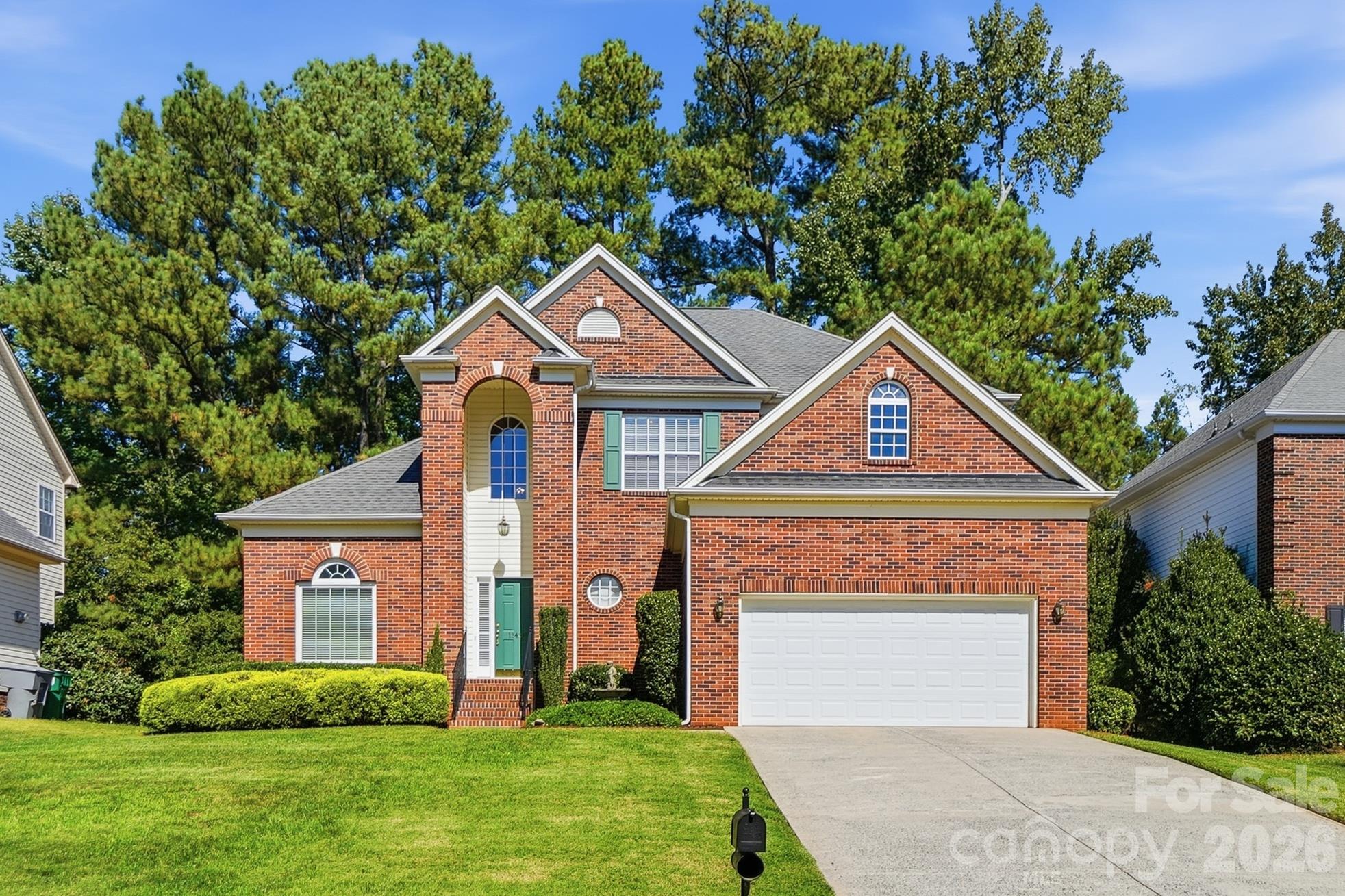 GREAT LOCATION! Ideally located just minutes from Ballantyne's premier shopping, dining, entertainment, and everyday conveniences, this beautifully maintained 4-bedroom, 2.5-bath home offers 2,410 heated square feet of exceptional living space. Fresh interior paint complements a light-filled floor plan highlighted by a dramatic two-story foyer, formal dining room with chair rail and crown molding, an open kitchen with granite countertops and abundant workspace, and an impressive two-story great room featuring a fireplace and built-in cabinetry. Luxury vinyl plank flooring extends throughout the home, including the bedrooms, with no carpet to maintain. A hard-to-find main-level primary suite serves as a private retreat and features elegant French doors opening directly to an exceptional backyard oasis designed for both relaxation and entertaining. Outdoor amenities include a spacious deck, gazebo, hot tub, paver patio ideal for grilling and outdoor dining, a beautifully landscaped garden bed accented by a retaining wall, and an irrigation system to help maintain the lush surroundings. The four-season sunroom provides additional year-round living space and features sliding glass panels that open to screened ventilation, allowing you to enjoy fresh air and outdoor views in comfort throughout the seasons. Upstairs, spacious secondary bedrooms are complemented by a large walk-in attic storage area providing abundant storage rarely found in homes of this size. Recent investments in comfort and efficiency include upgraded HVAC ductwork and distribution components, crawl space dehumidification, and an integrated Lennox PureAir whole-home air purification system. Residents also enjoy neighborhood walking trails and a playground just a short stroll away, all within an area served by highly rated schools. Combining a sought-after primary-down floor plan, exceptional outdoor living, thoughtful updates, abundant storage, and an unbeatable location near Ballantyne, this home offers the lifestyle today's buyers are seeking.