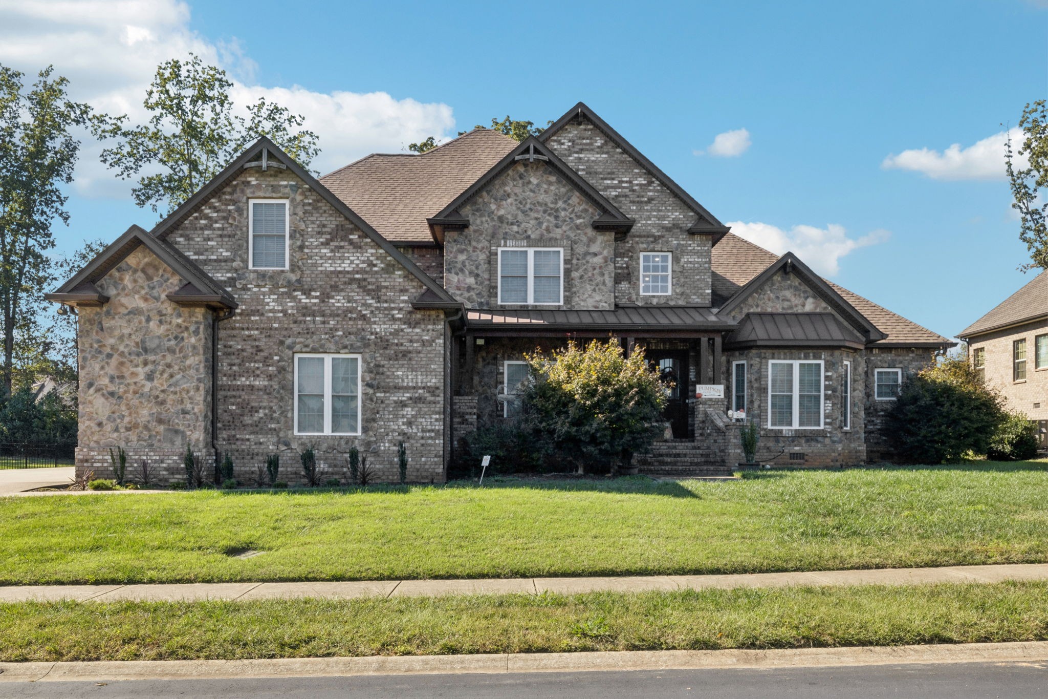 Luxury Family Living | 5,072 Sq Ft Custom-Built Estate with Main-Floor Primary Suite & Outdoor Entertaining Space

This stunning 5,072 square foot custom-built estate perfectly blends refined luxury with functional design — crafted with the modern family in mind. Located in a prestigious neighborhood, this home offers generous space, upscale finishes, and thoughtfully designed features for everyday living and entertaining.

Enjoy the convenience of a main-floor primary suite with spa-style bath, dual walk-in closets, and ultimate privacy. Upstairs, you'll find three oversized bedroom suites, each with a private bath — ideal for children, teens, or guests.

The heart of the home is the expansive open-concept kitchen, featuring high-end appliances, an oversized island, walk-in pantry, and seamless flow to both the formal dining room and sunlit breakfast room.

Designed for the way families live today, the home also features:

Dedicated home office perfect for remote work or study

Spacious storage room to keep everything organized

On-site storm shelter for added peace of mind

Elegant living areas with custom finishes throughout

Impressive 30' x 18' covered patio – ideal for year-round outdoor dining, entertaining, or relaxing in comfort

Whether you're hosting large gatherings or enjoying quiet evenings at home, this residence offers the space, comfort, and luxury your family deserves — inside and out.