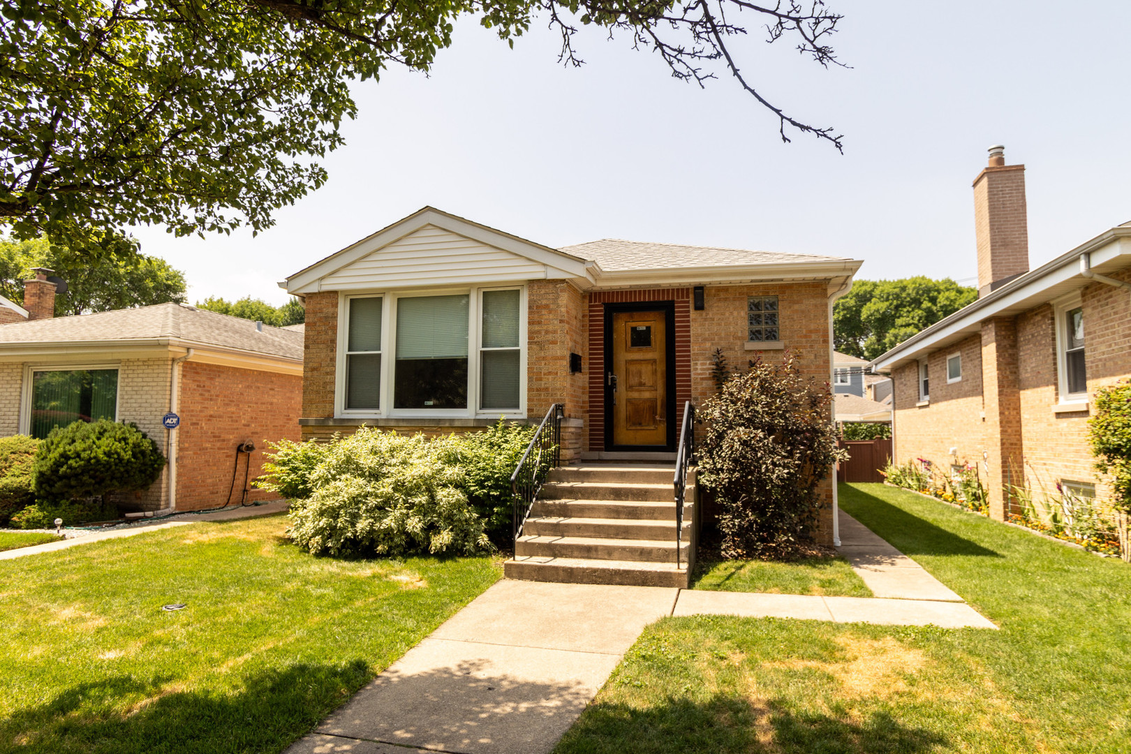 MUST-SEE !!!! Beautifully updated 3-bedroom, 2-bath home located in the desirable Big Oaks neighborhood of Chicago. This property features top-of-the-line finishes, including an updated kitchen with modern cabinetry and stainless steel appliances, as well as beautifully renovated bathrooms.    The fully remodeled lower level offers a spacious family room with a designated dining or entertaining area - perfect for hosting guests or relaxing with family. There's also ample storage and laundry space, providing function along with style.    Enjoy the added features of a heated and air-conditioned sunroom, currently used as a relaxing space. Major recent updates include a new HVAC system (2020), new roof (2024), hot water tank (2020), sump pump (2024), upgraded copper plumbing (2020), and 200 AMP electrical service (2020).    Step outside into your backyard oasis featuring a newer, extra-deep 2.5-car garage with a front-facing party door that opens into the yard. Adjacent to the garage is a private sitting area, ideal for grilling and gathering with friends and family.    Conveniently located near Garvey Elementary, public transportation, restaurants, and shopping - this home truly has it all!