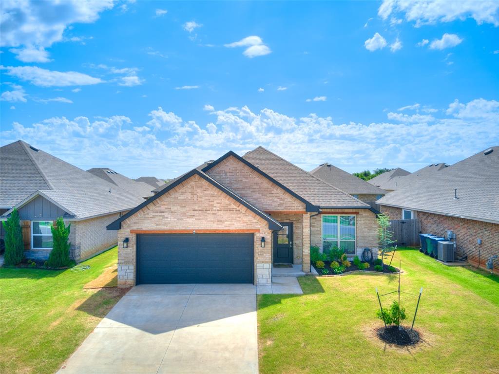 Welcome to this stunning 4 bedroom 3 bathroom home in the sought-after Castleberry Addition, where style meets function in an open-concept floor plan. As you step inside, you’re greeted by wood-look tile flooring that flows seamlessly through the main living area, complemented by a beautiful fireplace that creates a warm and inviting atmosphere. The heart of the home is the spacious kitchen, featuring a large island with a farmhouse sink, sleek stainless steel appliances, a gas stove, vaulted ceiling—perfect for both everyday living and entertaining. The open layout allows you to stay connected to the living and dining spaces while preparing meals. Retreat to the primary suite, where relaxation awaits. Enjoy a luxurious tiled walk-in shower, a deep soaking tub, and dual sinks offering ample counter space. It’s the perfect combination of comfort and style. Additional highlights include access to fantastic neighborhood amenities such as a playground, pool, clubhouse, and fitness area. Don’t miss your chance to call this beautiful property home!