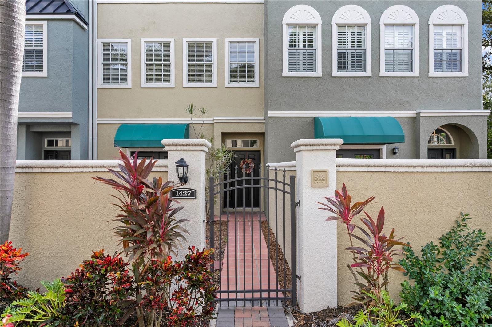 Nestled in the heart of Tampa’s most coveted waterfront enclave, this brownstone-style
townhome offers the perfect blend of timeless design and modern convenience.
Located on picturesque Harbour Island, a privately gated oasis just moments from
downtown, this residence invites you to experience elevated city living with a coastal
twist. Step through the gated entry into your private courtyard — a lush, sun-drenched
retreat ideal for entertaining, gardening, or unwinding with a glass of wine. Inside, the
open-concept layout flows effortlessly between the expansive living and dining areas
and a well-appointed eat-in kitchen featuring abundant cabinetry and prep space.
Designed for flexibility and comfort, the home features a rare dual primary suite
configuration, each with its own en-suite bath, plus a versatile bonus room that easily
serves as a third bedroom, home office, fitness studio, or media lounge. The primary
suite boasts a custom walk-in closet and serene natural light, creating a true sanctuary.
Enjoy direct access to Harbour Island’s beautifully landscaped walking paths, and take
advantage of the community’s unmatched amenities — from waterfront parks and
playgrounds to the scenic water walk. For boating enthusiasts, nearby slips are
available for rent or purchase, adding a layer of luxury to your lifestyle. Walk to five on-
island restaurants, LifeTime Fitness, Amalie Arena, Water Street, and Tampa’s vibrant
arts and entertainment district. Zoned for top-rated Gorrie Elementary, Wilson Middle,
and Plant High School, this location offers both prestige and practicality.
Don’t miss your chance to own a piece of Harbour Island — where every day feels like a
getaway. Schedule your private tour today.