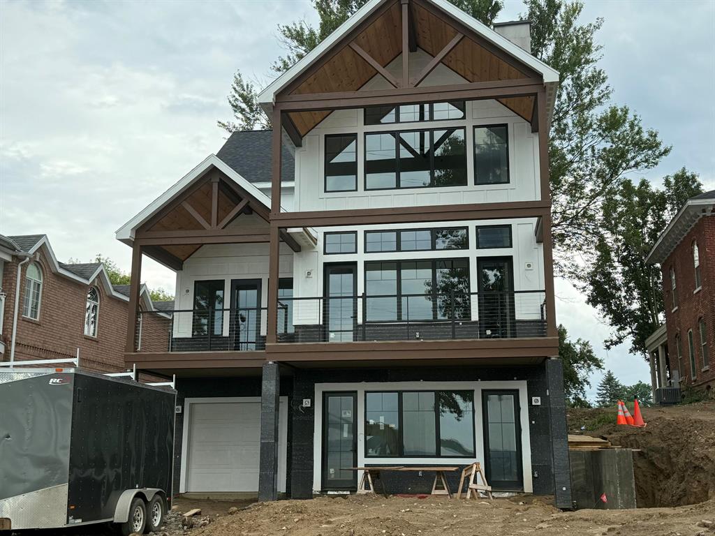Once in a generation opportunity for brand new construction lake home, thoughtfully designed and crafted, on rare oversized estate-sized, sandy bottom, lake lot.'Maplewood Shore' represents the apex of Michigan lake living.  Designed with indoor/outdoor family entertaining in mind.  Gorgeous elevated lake views from 27 ft vaulted glass wall.  Beautiful herringbone cut luxury composite decking.Plenty of space for guests and all your lake toys with integrated, finished, lakeside garage + 5 car detached matching garage.Designer landscape package includedOption available for Buyer to use lake & dock now while you wait to close.Builder closing contribution incentive available, inquire now for details12-Month Builder Home Warranty IncludedViewings and offers encourag