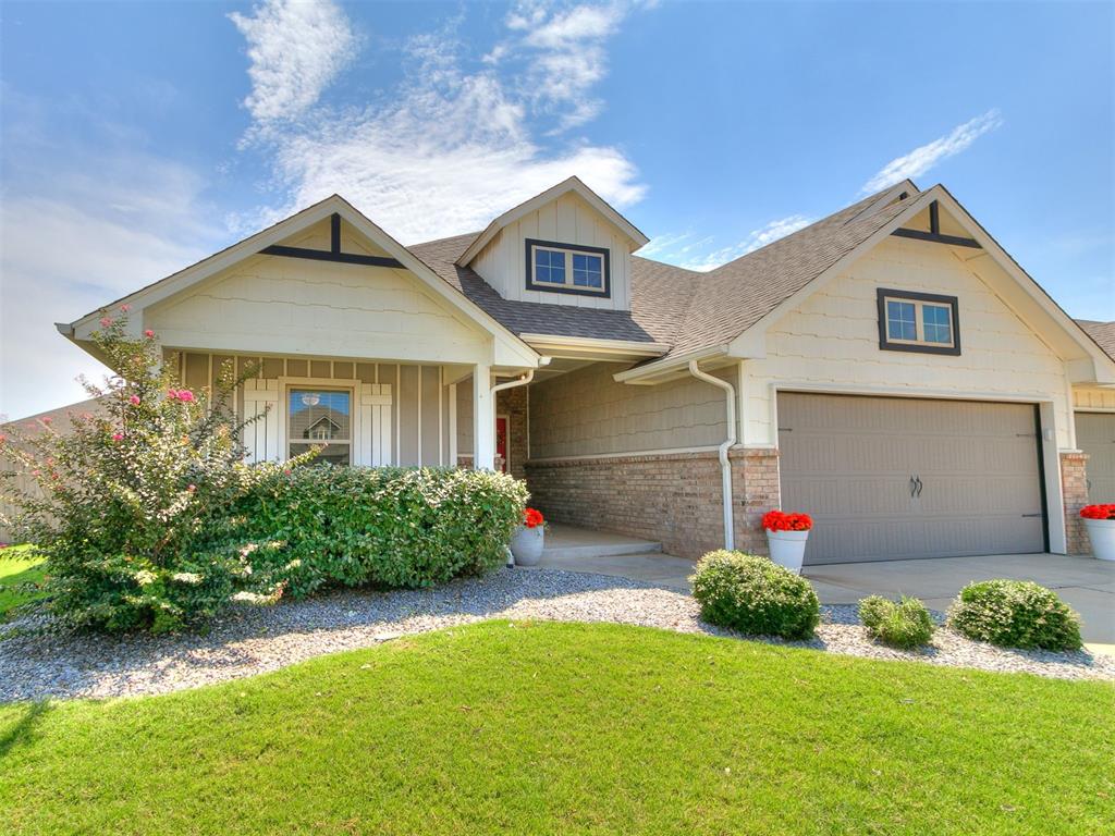 Welcome to the home of your dreams!  This like new home offers everything you can dream of and more. From high end upgrades to energy efficiency and safety features. The beautiful home is nestled on a premium oversized, corner lot (.25 mol). The covered front and back porch offer an additional 285 SF of outdoor living space, including a wood burning fireplace on the back porch.
     The defined entry way leads into an open floor plan with lots of natural light which includes the living room, kitchen and dining area.  You'll love the wood look tile floors in the main living areas.  The family room boasts a gas log fireplace. The bright white kitchen which has 3CM quartz countertops, walk-in pantry, stainless steel appliances, custom vent hood and an island with seating for up to 6 people is a stunner! 
     The primary suite will not disappoint, boasting box ceiling, en suite bath with jetted tub, private toilet room, large walk in closet with 3rd row seasonal hanging available.  
     More extras include brand new fence, storm shelter in garage, outlet in garage for electric car charging, tankless water heater, doubled glazed, low E windows, new paint in main areas and primary bedroom and so much more!
     The Grove neighborhood offers lakes, walking trails, playgrounds, greenbelt areas, two pools, clubhouse and fitness center.  Don't forget it's close to Hefner Parkway, the turnpike and Grove Valley Elementary! Schedule your showing today!
 Buyer to verify all information.  Seller is related to listing agent.