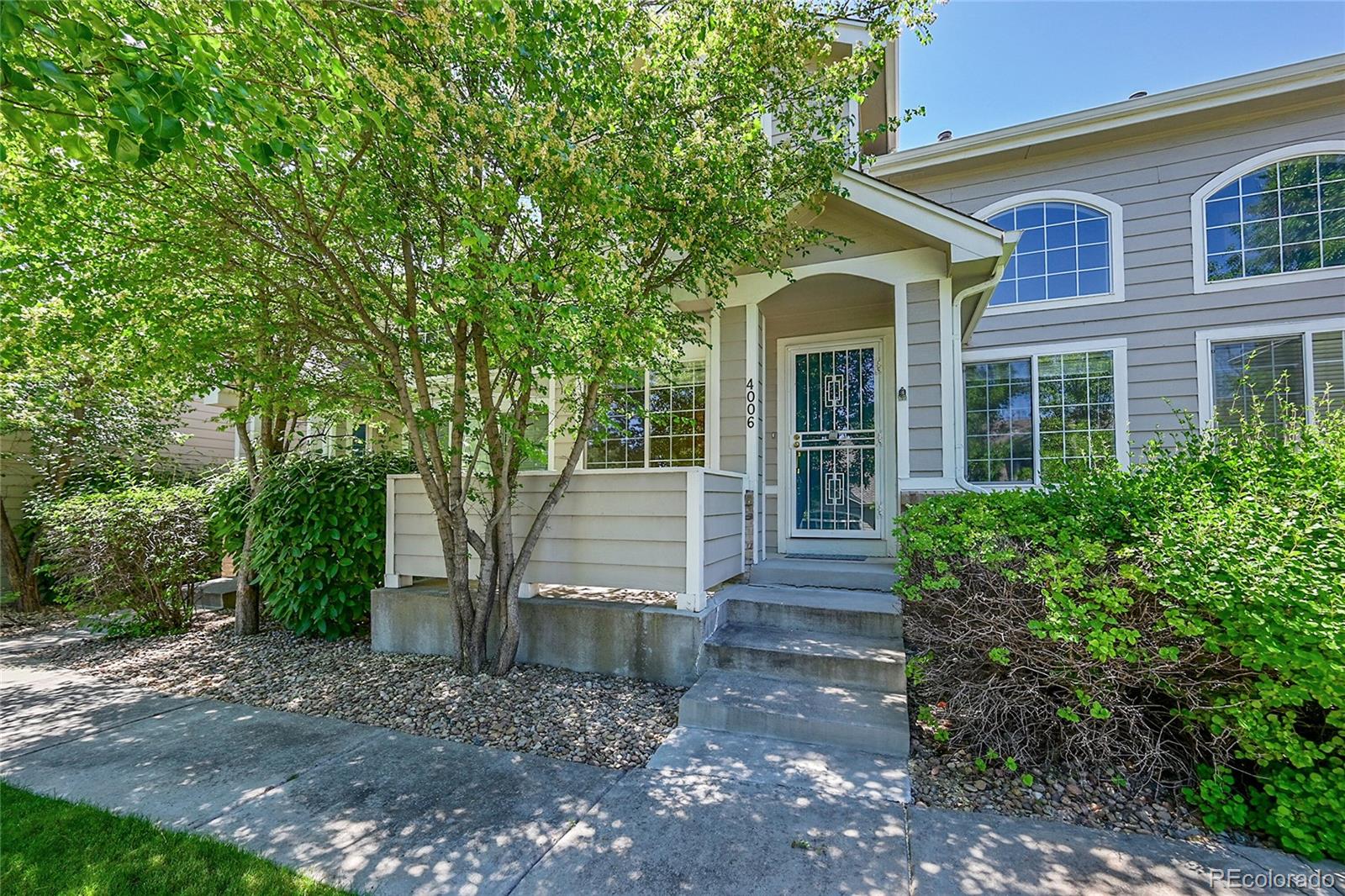 Fantastic townhome with finished basement in the upscale Vista Pointe community!  This impressive unit greets you with hardwood floors and soaring vaulted ceilings.  The spacious great room features a cozy gas fireplace and a ceiling fan for all weather comfort (in addition to the central AC of course).  There's a convenient dining room with an eating counter with the kitchen.  All kitchen appliances are included, smooth top stove, microwave, dishwasher & refrigerator, and a spacious pantry holds everything you need.  Upstairs features two bedrooms, two bathrooms and an upstairs laundry with the washer & dryer included.  Vaulted ceilings abound up here too, and the primary suite includes a full bath and large walk-in closet.  Six panel doors and a radon system are terrific quality of life upgrades.  The basement is finished with a larger family room, bath and space for another bedroom if desired.  A two car garage completes your slice of paradise.  Centrally located with easy access to the Streets at Southglenn, DTC, downtown, C-470 & I-25.  Compare to any other unit near this price and you'll be impressed!  Flexible possession.