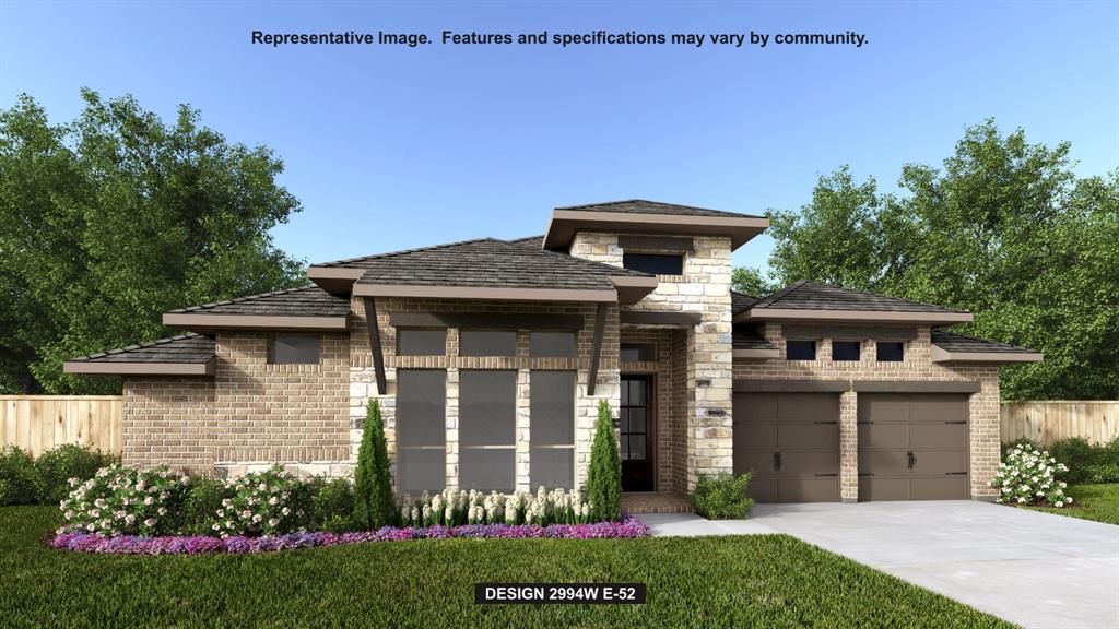 Welcoming entry that flows to a large game room with French doors. Spacious family room with a wood mantel fireplace and wall of windows. Island kitchen with a double wall oven, 5-burner gas cooktop, and corner walk-in pantry opens to the dining area. Private primary suite with three large windows. Primary bathroom features a double door entry with dual vanities, freestanding tub, glass enclosed shower and two walk-in closets. Secondary bedrooms with walk-in closets and a Hollywood bathroom complete this spacious design. Covered backyard patio. Utility room and mud room just off the three-car garage.