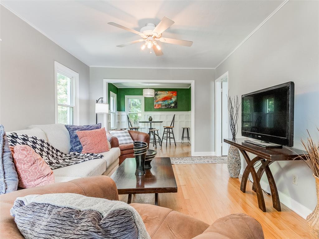 Ask the listing Realtor about the $0 down payment and low interest rate program through a preferred lender! Stunning renovated home in the heart of OKC! Gorgeous charming 2-bedroom, 2-bath home blends timeless character with thoughtful updates, creating the perfect place to relax, entertain, and enjoy everything Oklahoma City has to offer.Inside, you'll find beautifully refinished original oak hardwood floors flowing throughout the home, adding warmth and character to the open living and dining area. The functional kitchen features a modern tile backsplash, vent hood, refrigerator, and plenty of space for everyday living. An inside laundry room adds convenience, while the spacious primary suite offers a beautifully updated bathroom complete with designer tile work, a walk-in shower, and double vanities.Major updates provide peace of mind, including a brand-new roof, new siding, and new vinyl windows. Step outside to discover a huge backyard with endless possibilities for gardening, entertaining, or simply enjoying the outdoors. The detached garage offers excellent space for a workshop, hobby area, or extra storage, and there's an additional storage shed for even more flexibility.Ideally located just minutes from some of OKC's favorite destinations, including The Oak, The Plaza District, Trader Joe's, restaurants, shopping, and entertainment, this home offers the perfect combination of charm, updates, and convenience.Don't miss your chance to own this inviting Oklahoma City gem!