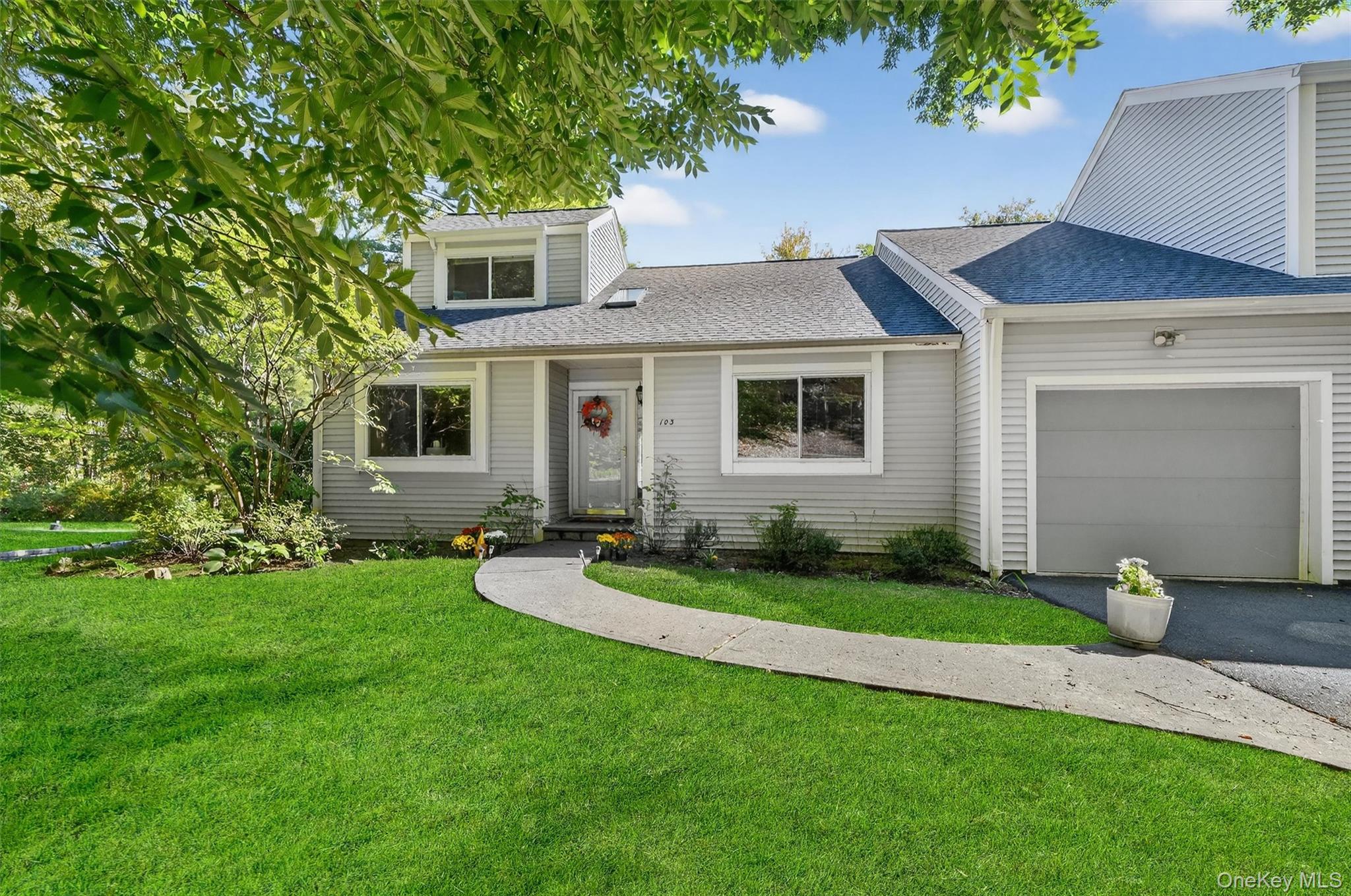 Welcome to this exceptional townhome offering a rare blend of style, comfort, and refined living. Step inside to an inviting open-concept layout with a wealth of natural light, high ceilings, new ceiling fans, skylights and beautifully finished interiors accents. The spacious living and dining areas flow seamlessly into an upscale well-appointed chef's kitchen, ideal for both everyday living and entertaining. Thoughtful updates throughout the home enhance its style and appeal. Also on the main level are the primary bedroom ensuite and 2nd bedroom that offer privacy and relaxation. The serene primary suite with an abundance of closet space offered by the 2 walk-in closets and a well-appointed bath is your perfect retreat. The 2nd bedroom is spacious and features 2 double closets for plenty of storage. The lower level features exceptional versatility with a spacious third bedroom, two expansive family rooms, a wet bar with granite countertops and flooring, a wine cooler and an additional dining area that opens to a private paver patio through updated sliding glass doors. This level also includes a fully tiled third bath with double sinks and a granite tiled walk-in shower, plus a laundry/utility room and several key system updates, including a whole-house dehumidifier and a 2-year-old hot water heater boiler mate. On the top floor loft you will enjoy the luxury of even more space for a guest room, private office or maybe a yoga/fitness room. Additional interior features include 8 closets, an attached garage, private driveway, a massive attic above the garage/bedrooms with new pull down staircase for storage, central vacuum, brand-new wood floors on the main level, new bedroom carpeting with upgraded padding and a surround sound/intercom systems. Outdoor living is equally impressive, with access to lush green space and picturesque views of the fountain and pond. Whether from the main level bedroom windows, living room 9' sliding glass door, deck or patio-the views of nature are stunning. The community offers guest parking, a recently renovated community pool, tennis and pickleball courts, a basketball court and beautifully landscaped grounds with lush lawns and mature specimen plantings. The property is part of a well-maintained community of just 106 homes.This is a rare opportunity to own a townhome that truly stands out—move-in ready and designed to impress.