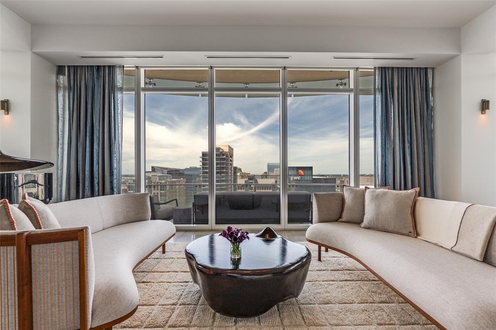 A rare opportunity, this north-facing Home 2401 at Museum Tower offers 3,745 square feet of refined living with panoramic views framed by floor-to-ceiling windows fitted with motorized shades. Venetian plaster walls in the entry set the tone for timeless sophistication. The open floor plan connects expansive living and dining areas to a chef-inspired kitchen showcasing a custom island with Basalt counters, Miele appliances including a gas cooktop, warming drawer, and dual wine refrigerators and deep drawers with a custom organization system. The butler’s pantry elevates entertaining with stainless steel backsplash, additional prep space, Miele ice maker, and professional dishwasher. Majestic views of the iconic Dallasskyline, Klyde Warren Park, Uptown and the Dallas Arts District make every room a sight to be seen.A spacious sky room with integrated entertainment system creates an additional retreat for gatherings. The primary suite offers a walk-in Poliform closet and spa-like bath with heated floors, while the secondary suite provides equal comfort. Outdoors, a private terrace finished in limestone tile with pet guard extends the living space. Curated services-amenities: 24-7 concierge-valet, 80-ft pool, great lawn, fitness room, saunas, guestsuites, dog parks and more.