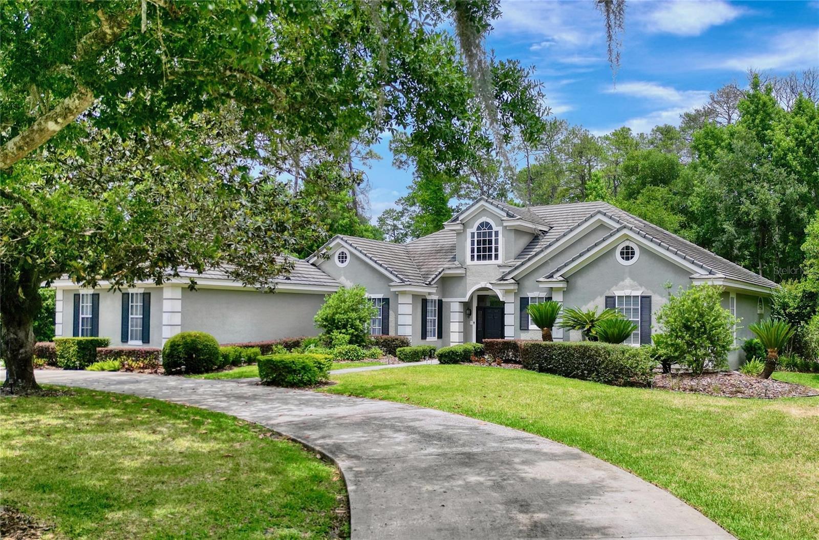 ~MOTIVATED SELLER~ 
Welcome to your dream home in the highly sought-after gated community of WINGFIELD NORTH 2.  Nestled in the distinguished and well established city of Longwood. Conveniently located within minutes to I4, Lake Mary, Sandford, downtown, restaurants and shopping. This beautiful 4 bedroom 4.5 bath boast a total of 3,286 sqft and sits on a vast 1.1 acre of land. This beautiful home features a saltwater pool, spa, outdoor kitchen, outdoor bathroom & outdoor shower. The exceptional home was perfectly designed for a growing family in mind or someone looking for large comfortable living space. The perfectly landscaped exterior seamlessly blend all natural elements with the meticulously manicured trees, lawn and lush greenery. Step into the foyer and you will delight in the beautiful view through the Anderson® 400 series French doors of nature's picture perfect conservation lot. The view of the  conservation lot provides peaceful comfort & serenity while the clear blue sparkling pool adds additional relaxing ambiance. The heart of this home lies in the exquisite kitchen with an island with a spacious breakfast bar that opens to the main family living space. The kitchen showcases granite countertops with chef grade appliances perfect for culinary enthusiasts as well as family and friends gatherings. The master Suite is the perfect retreat meticulously designed for relaxation. The spa-style master bath includes a jetted tub, dual vanities, walk-in shower and large master walk-in closet. all bedrooms have a dedicated full en-suite. The ultimate Florida lifestyle awaits you. Schedule your tour! This property may be under audio/visual surveillance.