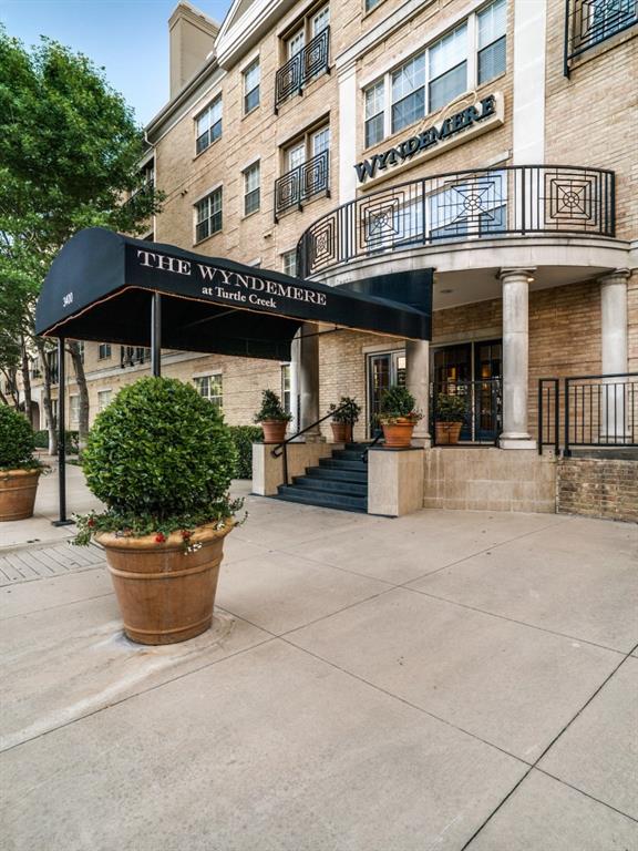 Enjoy the Best of Dallas Living at Wyndemere Condominiums! Ideally located in the desirable Turtle Creek and Oak Lawn area, this inviting 2 bedroom, 2 bath residence offers a wonderful blend of comfort, convenience, and urban living. Enjoy a lovely view from the Juliet balcony overlooking the resort-style pool and beautifully landscaped courtyard. The thoughtfully designed floor plan offers flexibility for everyday living, entertaining, or working from home. Engineered hardwood floors enhance the living and dining areas, while the wood-burning fireplace creates a warm and inviting focal point. Both bedrooms feature private ensuite bathrooms and walk-in closets, providing comfort, privacy, and ample storage The kitchen features recently added stainless steel appliances, and a new HVAC system installed in 2025 adds comfort and peace of mind. The refrigerator, washer, and dryer will convey with the property for added convenience. Wyndemere offers an impressive array of amenities, including 24 hour concierge desk service, a resident clubroom and business center with kitchen, a sparkling pool and spa, private green space, grilling areas, dog area, fitness center, and gated garage parking. Two dedicated garage parking spaces, conveniently located near the elevators, complete this desirable offering. Additional parking spaces are available for lease. HOA includes Spectrum internet and TV services. Enjoy an exceptional location just moments from Uptown, Turtle Creek, premier dining, shopping, and Dallas’ vibrant city life. Experience the ease of lock-and-leave living with amenities and convenience in one of Dallas’ sought-after neighborhoods!