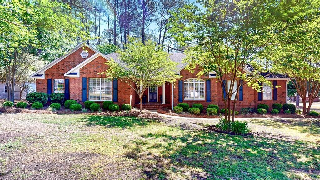 If you've been waiting on a home that doesn't need a to-do list this is it. Set on a corner lot in Ivy Hills, this brick home has been carefully maintained and it shows from the moment you pull up. The roof is less than 10 years old, the interior has been freshly painted, and everything feels clean, solid, and ready for its next chapter.  Inside, the layout just works. You've got a spacious living room with great natural light, a formal dining room for gathering, and hardwood floors that run through the main areas. The kitchen features granite countertops and plenty of room to cook and host without feeling crowded. The primary suite is oversized, with its own sitting area that gives you a little extra space to unwind at the end of the day. The bathroom includes double vanities, a garden tub, and a separate shower, along with a walk-in closet. Out back, the covered deck with a pergola gives you shade without closing things in, perfect for slow mornings or evenings outside. The yard has been professionally landscaped, with space to add a garden if that's something you've been wanting, plus a storage shed for tools and equipment. Living in Ivy Hills also means you've got access to the neighborhood pond, adding just a little more to enjoy without ever leaving home. And the location is hard to beat, less than 10 minutes to downtown Thomasville, Archbold Memorial Hospital, Lowe's, Publix, plus all the shopping and restaurants you'll need.  Simple, well cared for, and ready when you are.