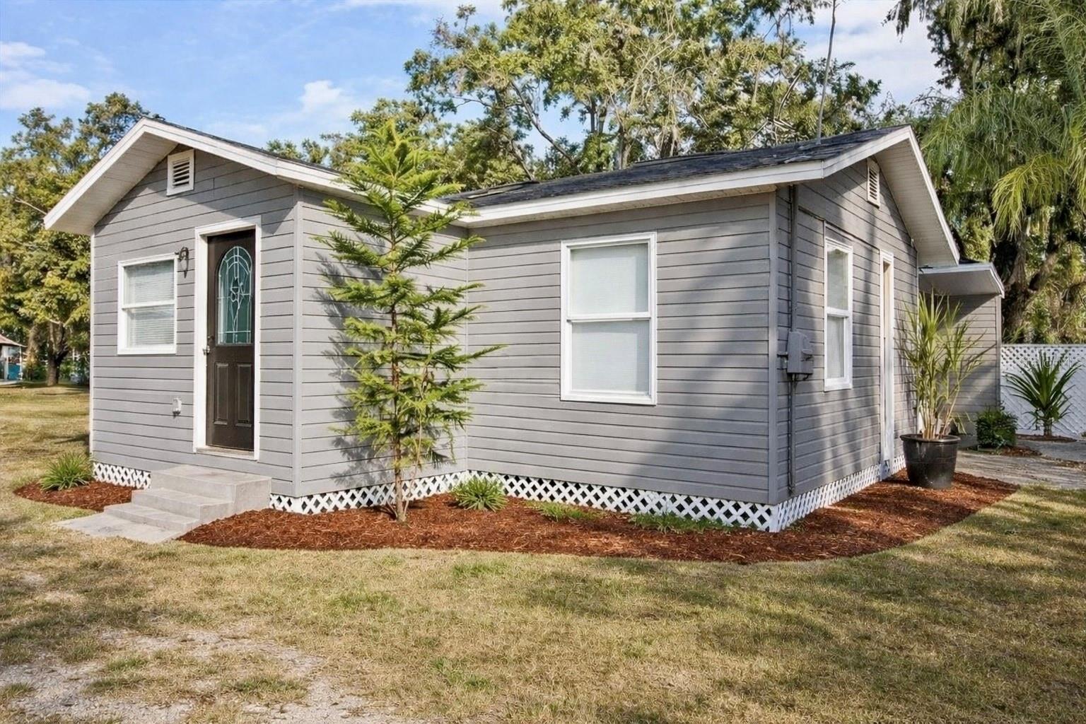 One or more photo(s) has been virtually staged. Located in Plant City, this property presents an opportunity for homeowners or investors seeking value and flexibility. This 2-bedroom, 1-bath home is positioned on a corner lot offering usable outdoor space.Inside, the home features stainless steel appliances, including a refrigerator and range, along with natural light throughout the living areas. Windows and water heater have been replaced, adding value where it matters most.With no HOA, no CDD, and convenient access to shopping, dining, and major roadways, this property is well-positioned within the area.This property is currently zoned for residential but can easily be converted into mixed use zoningSchedule your private showing today.