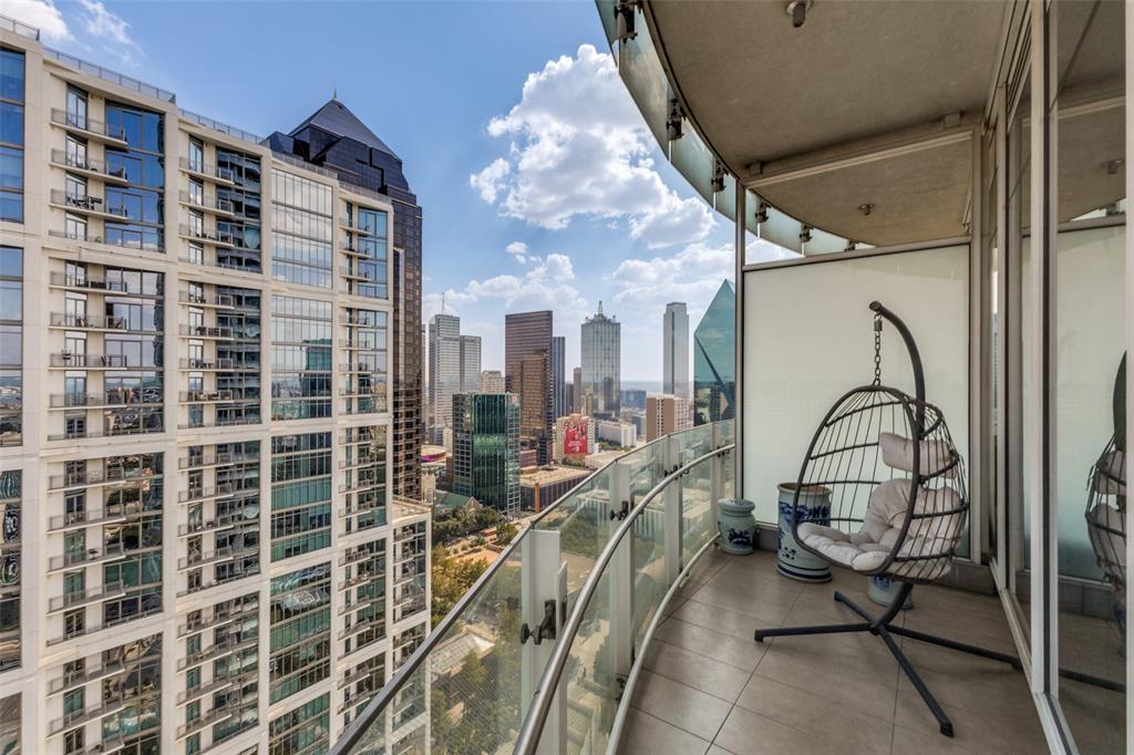 Elevated high above the Dallas Arts District, Residence 2802 at Museum Tower offers an exceptional combination of privacy, generous living spaces and dramatic views. This rare three-bedroom, three-bath residence is wrapped in floor-to-ceiling windows, creating light-filled interiors and an extraordinary vantage point from one of the building’s highest residential floors.Private elevator access opens directly into the residence, creating an intimate sense of arrival and setting the tone for sophisticated high-rise living. Expansive living and dining areas are framed by walls of glass, while the three-bedroom floor plan provides beautifully proportioned spaces for everyday living, overnight guests or a private study.Located in the heart of the Dallas Arts District, Museum Tower offers an urban lifestyle just moments from Klyde Warren Park, renowned cultural destinations, restaurants and Dallas’ financial district and the Texas Stock Exchange. Museum Tower offers residents an exceptional collection of amenities and services, including 24-hour concierge and valet, resort-style pool, great lawn, fitness center, saunas, guest suites, and dog park. World-class dining, shopping, and entertainment are moments away, offering a truly walkable and sophisticated urban lifestyle.