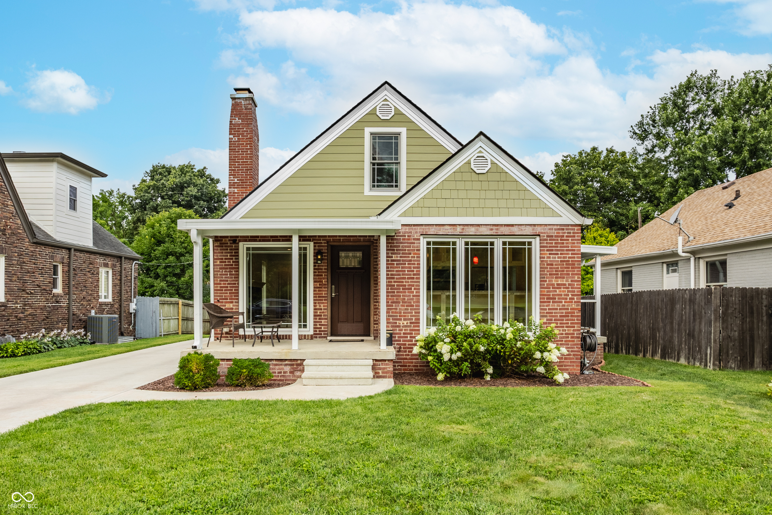 Imagine finding the perfect blend of timeless character and modern living. This beautifully restored 1940s home has been completely updated from the studs out, offering the charm of a classic home with the comfort, efficiency, and technology today's buyers expect.    Every detail has been thoughtfully renovated while preserving the home's original character and architectural appeal. The extensive list of improvements is available in the Additional Information and showcases the exceptional care and investment made throughout the property. From restoring the original hardwood floors to their natural beauty and converting the once attic into a fabulous primary suite you will delight in the beauty and style of this charming home.     Location is equally impressive. Situated in one of Broad Ripple's most desirable neighborhoods, this home is directly across from a beautiful city park and within walking distance of restaurants, shopping, entertainment, and all the vibrant amenities that make Broad Ripple one of Indianapolis' most sought-after communities.    If you've been searching for a home with personality, quality craftsmanship, modern updates, and an unbeatable location, your search ends here. This is more than a house. It's a place to call home.