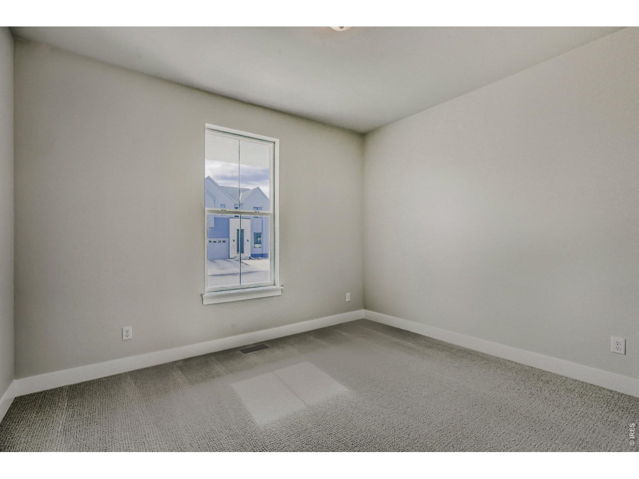 Step into this spacious South facing single-story home offering 3 bedrooms, 2 baths and 2,155 square feet of open concept living space. The well-appointed kitchen features KitchenAid appliances, built-in convection double ovens, 36" gas cooktop, a large island with beautiful quartz counter tops, plenty of counter and cabinet space, a desk area for added convenience and a generous walk-in pantry, perfect for those who love to cook and entertain. The kitchen seamlessly flows into a dining nook and large family room with a floor to ceiling tiled fireplace creating an inviting atmosphere for gatherings. The main bedroom is a true retreat with a freestanding tub, generous shower with bench, separate dual vanities, and two walk-in closets for ultimate storage and organization. Fully constructed closets with shoe racks ensure everything is neatly organized. Enjoy a dedicated laundry room with a utility sink, while the 3-car garage offers plenty of room for vehicles and extra storage. The unfinished basement with a 9' ceiling has potential for additional living space tailored to your needs. Smart Home technology enhances convenience, security, comfort and peace of mind. Stay comfortable year-round with energy efficiency and with a tankless hot water heater. With its thoughtful design and modern amenities, this home is ready for you to design and make it your own.
