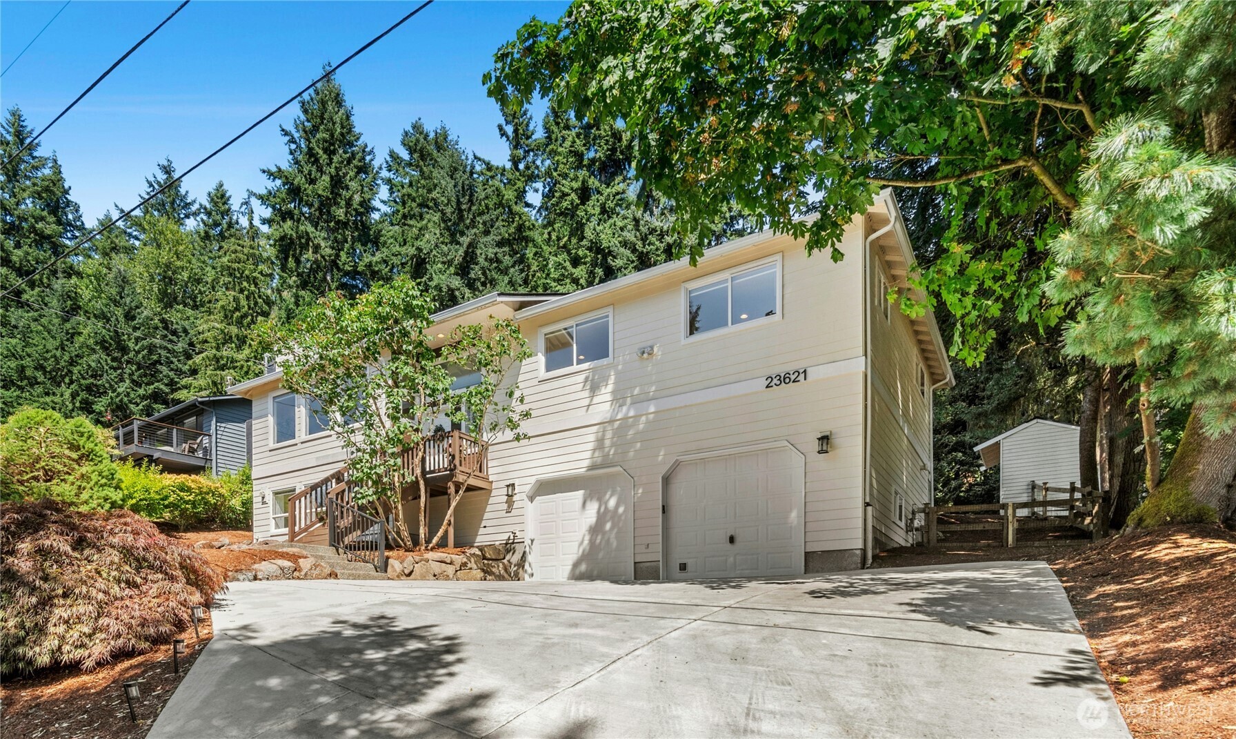 Tucked away on a quiet, dead-end street, this spacious home offers room to grow, play, and unwind. Set on a generous lot, this property borders tranquil Shelton View Forest - perfect for morning walks or weekend adventures right out your door. Upstairs are 3 bedrooms and 2 bathrooms, including the primary with en suite, as well as multiple living spaces ideal for entertaining, or everyday comfort. Lower level has a separate entrance, 4th bedroom and additional bathroom. Power and plumbing are in place, perfect for an ADU, guest suite, or multi-generational living. Just minutes to highly rated Northshore Schools, shopping, and commuter routes, this is Bothell living at it's finest!