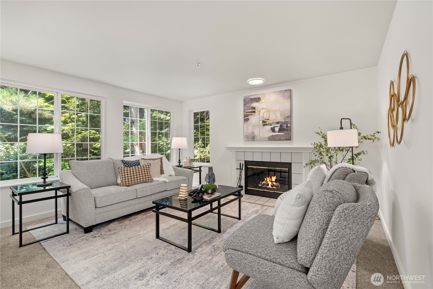 Tucked into the peaceful, wooded Brookshire community in South Bellevue, this beautifully updated original owner home offers the perfect blend of comfort, style and convenience. Featuring 2 spacious bedrooms, 1 full and ¾ bathrooms including a primary suite with two full closets, this move-in ready condo offers a dining area adjacent to the kitchen and showcases new interior paint, new carpet, new luxury vinyl plank flooring, new tile in the primary bath, new 4-inch baseboards, new black door hardware, contemporary light fixtures, stylish bathroom vanities and mirrors and freshly painted white kitchen cabinets with new hardware. The kitchen also features stainless steel appliances, while the inviting living room centers around a cozy wood-burning fireplace and opens to a spacious deck with a private storage closet. Complete with a detached 1-car garage, this exceptional home is adjacent to Mercer Slough Nature Park with miles of walking and biking trails, just 2 miles from downtown Bellevue’s shopping, dining, parks and everyday services, located in the highly rated Bellevue School District and offering easy access to I-405 and I-90 for a convenient commute.