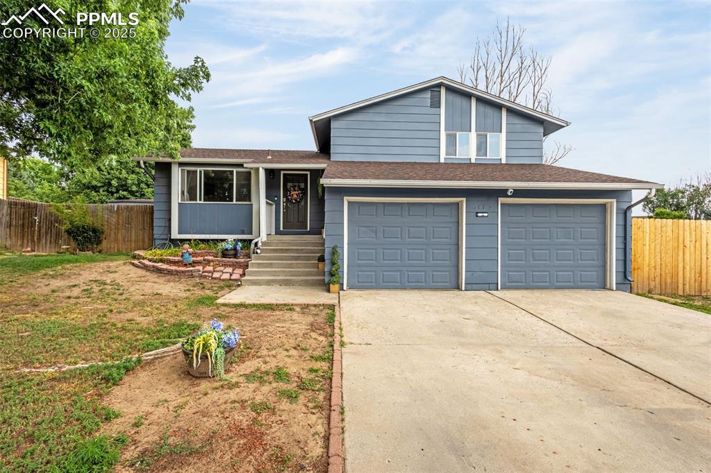 Welcome to this beautifully cared-for split-level home nestled in the desirable Clear View Estates subdivision. From the moment you step inside, you’ll appreciate the pride of ownership throughout.

The main level welcomes you with a bright and open living/dining room, perfect for entertaining or relaxing. Just beyond, the kitchen features white cabinetry, gleaming granite countertops, and stainless steel appliances—combining functionality with modern style.

Upstairs, you’ll find three comfortable bedrooms, including a spacious main bedroom that offers a peaceful retreat. The lower level boasts a generously sized family room with a sliding glass door that opens to a large backyard—ideal for outdoor gatherings, play, or gardening.

The fully finished basement adds even more versatility, complete with two additional bedrooms and a full bathroom, making it perfect for guests or a home office.

Additional highlights include a two-car garage and a convenient location near shopping, parks, and Fort Carson Army Base.

Don’t miss the opportunity to make this move-in-ready gem your next home!