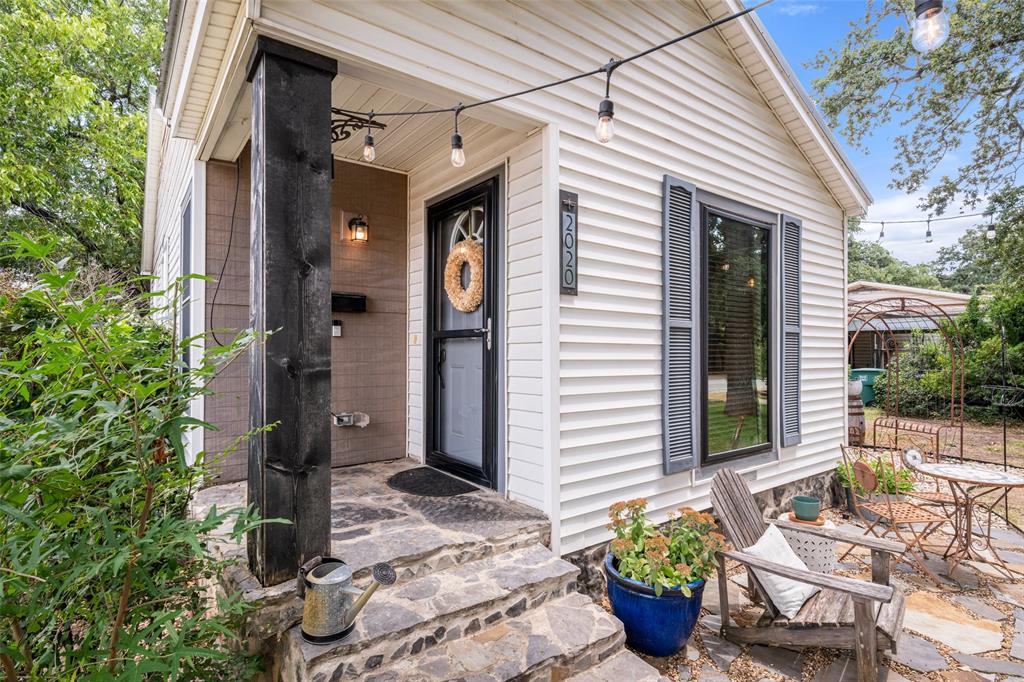 BUYER FINANCING FELL THROUGH!!! BACK ON MARKET!!Welcome to this well-maintained and inviting 2-bedroom, 1-bath home, perfectly blending comfort, charm, and convenience. Nestled in an unbeatable location 5 minutes from Downtown Fort Worth and just a short distance from the iconic Fort Worth Stockyards, you'll enjoy easy access to premier dining, shopping, and major highways—making your daily commute a breeze. Step outside into your own private courtyard oasis—ideal for entertaining guests or unwinding in total relaxation. This thoughtfully designed outdoor space includes a sweet, climate-controlled bonus area that was previously used as guest quarters and is currently enjoyed as a cozy she-shed. Inside, you are likely to fall in love with the well-placed decor, appliances, and accessories—all of which the seller is happy to negotiate should anything pull at your heartstrings! Key upgrades include a durable standing seam metal roof (2019), a modern tankless water heater (2023), Foundation work with lifetime transferable warranty (2020) and a whole home water filtration system, ensuring energy efficiency and peace of mind. Whether you're looking for a full-time residence, a weekend getaway, or a high-potential investment for long or short-term rental, this home offers endless flexibility and appeal.