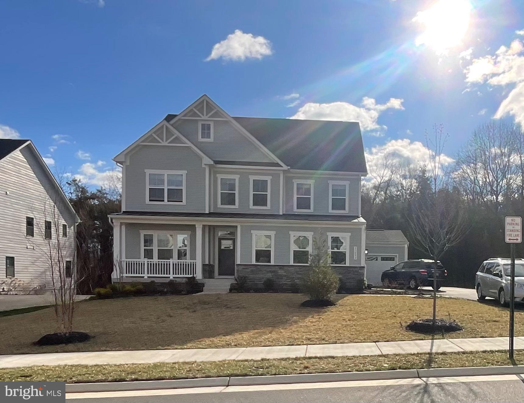 Welcome home to this beautifully maintained York model by Ryan homes on premium cul-de-sac lot with front porch and view of lake and woods in the highly sought-after Hartland community In Aldie located right on Route 50 for easy commute. Built in 2023, this impressive colonial offers over 5024 square feet of beautifully designed living space on a premium 0.27-acre west-facing lot. Featuring 6 spacious bedrooms, 5 full bathrooms, and a rare 3-car side-entry garage, this home blends modern elegance with everyday functionality.   Main Level Bedroom with Full Bathroom.Step inside foyer leads to an open-concept floor plan filled with natural light, wide-plank hardwood floors throughout the main level.  This home is highlighted by a gourmet eat-in kitchen with a large center island, double ovens, stainless steel appliances, and seamless flow of morning sun from woods into wide living room perfect for everyday living.  Other features on the main level include a spacious dining room, designated home office, and a separate room that can be used as an in-law suite, or second office.   Entertain family and friends in the fully finished walk-out basement which provides additional kitchen and bedroom.   Upstairs, retreat to generously sized bedrooms with loft including a luxurious primary suite designed for comfort and privacy.  Unwind in the primary suite which contains his and hers walk-in closets, a bathroom with dual vanities and extended glass shower.  The children's bedrooms include one room with its own en suite bath, and two rooms that share a jack and jill bathroom.   Enjoy outdoor living on the spacious lot with room to relax, play, or create your dream backyard.  House has an electric vehicle charger in the garage, 2 HVACS and 8 point Sprinkler system and wired for SimpliSafe Security system only(Activation paid by Buyer). Like new master bedroom set and dining furniture and more available upon request. Located in the heart of Loudoun County with access to top-rated schools, community amenities, shopping, dining, and commuter routes, this exceptional home offers the perfect blend of luxury, convenience, and lifestyle. Approved Second Kitchen in the Basement. Professional photos will be uploaded. Soon.