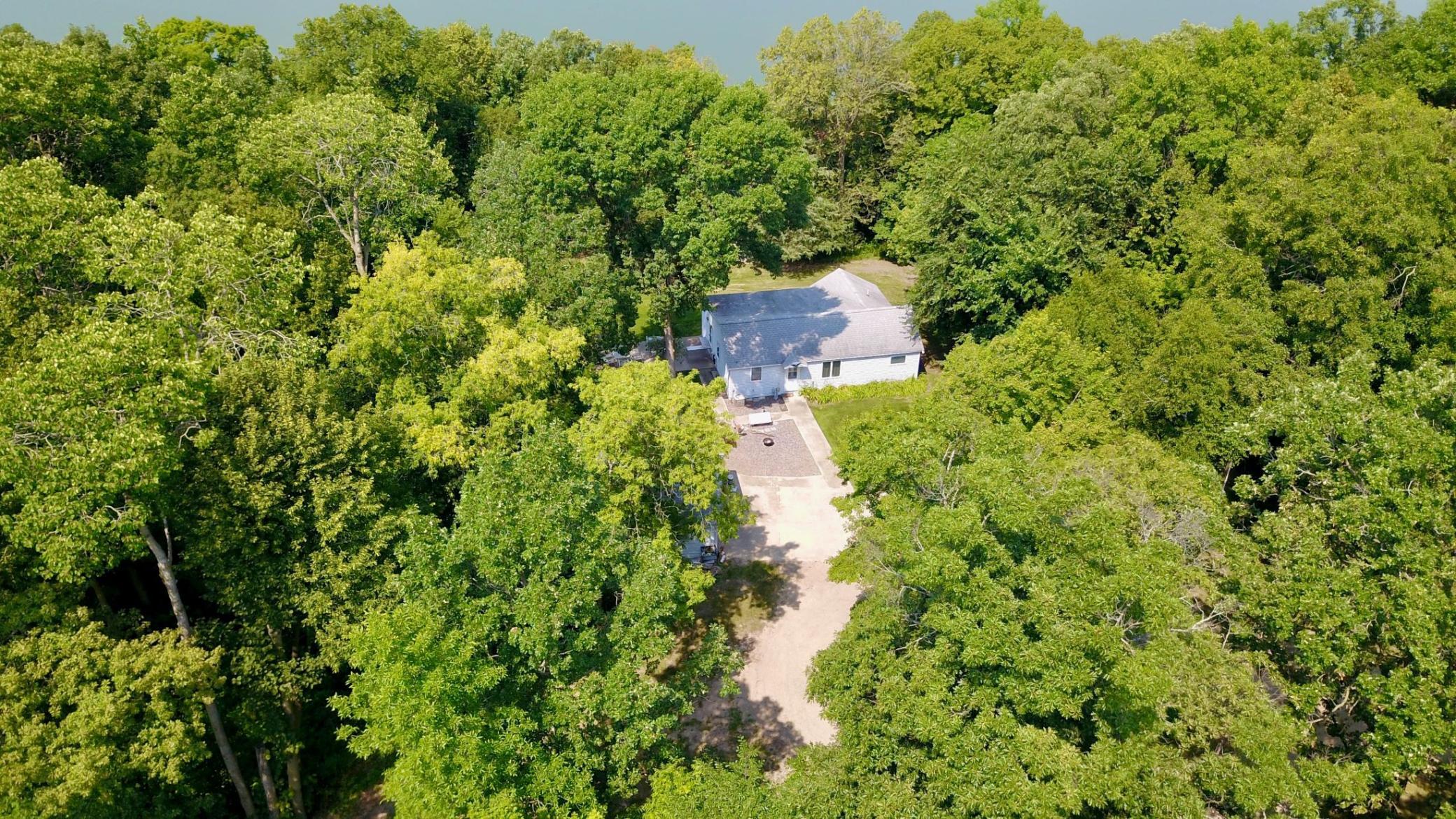Built in 1971 with additions in 1996, here is a 3 bed 1 bath Rambler on a Heavily wooded & Private 2.81 ACRE lot featuring 120+/- feet of frontage on 2126 Acre Big Sauk Lake! Big Sauk Lake features excellent recreational, fishing (natural walleye reproduction) and leisurely opportunities with several lakeside bar & grills. Property features: Western views, 30x64 shop for your toys, 20x22 Detached Garage, Patio & Deck!