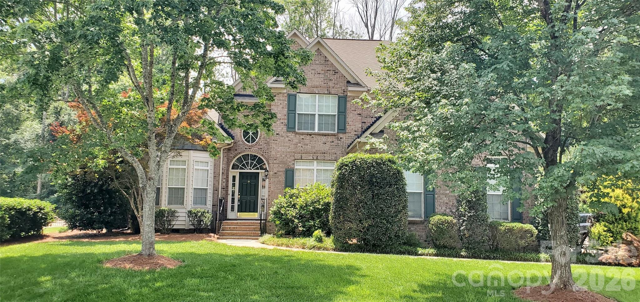 Stunning Brick Home in beautiful Hunter Oaks Subdivision with 3 car garage and manicured lawn on a cul-de-sac street within walking distance to Community Club house, Swimming Pool, and Tennis Courts. It offers open living floor plan with soaring two story Foyer, Dining Room with tray ceiling and extensive wainscoting, spacious Office with French doors and 12' ceilings, Arched Entry to the main Living area with Hardwood Floors, large Kitchen with Bay windows in Breakfast area, 2 Pantries and wall oven/microwave. There is a desirable Guest Bedroom downstairs with Full Bathroom. Gorgeous remodeled Owner’s Suite upstairs with tray ceiling Bedroom, Bathroom with two vanities, Quartz countertops, chic Glass shower, and separate water closet, well organized walk-in closet with built-ins.  There are two Secondary Bedrooms with Jack-and-Jill and large 5th Bedroom/Bonus, two ample size walk-in closets; an easy to reach walk-in attic space for storage. Fresh SW North Star paint in most of the home. Enjoy the best of both worlds - convenience of life with business centers, medical offices,  athletic clubs , upscale shopping, vast choice of dining, and easy access to I-485 offered by South Charlotte as well as Great Schools and low property taxes of Union county.