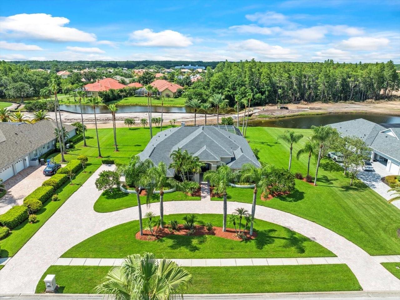 We are pleased to present this BEAUTIFUL REITES-FERNANDEZ built 4 Bedroom plus Office, 3.1 Bath, 3,299 sq. ft. home in CHEVAL! Situated on a SPECTACULAR 3/4 ACRE, GOLF COURSE/WATERFRONT LOT, this model-like property (it really was a builder model) features: a light and bright open floor plan with volume ceilings; a GORGEOUS KITCHEN with custom cabinetry, granite countertops, natural gas cooktop, and wine refrigerator; HARDWOOD FLOORING; crown molding and coffered ceilings; PLANTATION SHUTTERS; fireplace; a FABULOUS POOL/SPA PACKAGE with paver decking and outdoor kitchen; NEW ROOF 2021; lush landscape; 3 car side entry garage with paver circular driveway; IMMACULATE CONDITION and much more! Cheval has 3 convenient entry gates, all of which are staffed 24 hours a day (including 2 rovers), seven days a week. This Property is also conveniently located to the Cheval Golf Club and Athletic Center, TPC Tampa Bay, GREAT SCHOOLS, shopping, dining, parks, medical facilities, and the interstate system…a wonderful place to call home!
