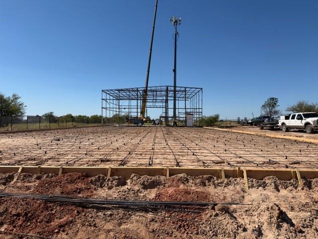 For sale or lease at 11113 S Sunnylane Rd in Moore. This new-construction industrial property offers an 8,800-square-foot warehouse with a 1,200-square-foot office shell inside the shop, glass front entry doors, and two restrooms. The property is fully fenced and gated with approximately 150 feet of road frontage. Utilities include well and septic, ONG gas, and OEC electric with three-phase power. Zoned industrial, with construction expected to be complete in mid-to-late December 2026. Offered for sale at $1,250,000 or for lease at $13 per square foot annually, NNN.