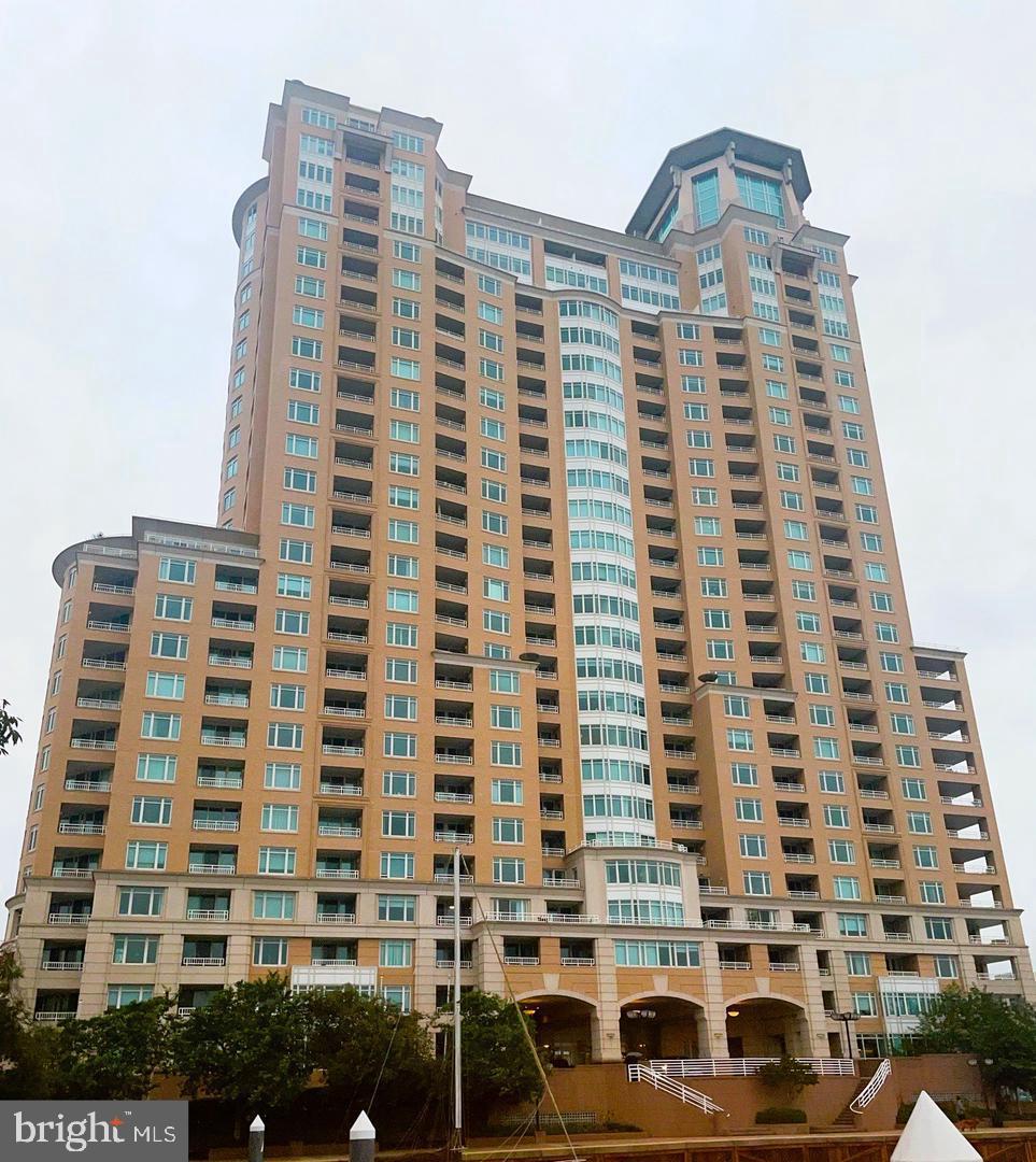 Exceptional Opportunity – Fully Renovated High-Floor Condo with Panoramic City & Harbor ViewsRare opportunity to own a fully renovated residence on one of the highest floors in this sought-after waterfront building. This stunning condo offers breathtaking, unobstructed bird's eye views of the entire city including the Inner Harbor, stadiums, Pier Six Pavilion concerts and events, and more.The designed floor plan features expansive windows that flood the space with natural light and showcase sweeping skyline and harbor vistas from every room. The spacious bedroom suite includes a walk-in closet and a suite bath with a stall shower and Jacuzzi tub. The open-concept kitchen and living area open to a private balcony.This unit has been fully renovated with modern finishes, premium materials, and updated systems, offering a truly turnkey lifestyle.Building Amenities & Services:Gated garage parkingExtensive fitness center with steam room and saunaIndoor and outdoor swimming pools24/7 front desk concierge serviceBilliards room and multiple social loungesFully equipped business center and conference roomsGuest suites for overnight visitorsDiscounted marina boat slipsBeautifully landscaped community grounds with walking/jogging paths, seasonal flowers, and decorative water fountainsOn-site gourmet deli with patio diningCommunity security staff and guest parkingPrime Location:Enjoy immediate access to the best of city living — nightlife, shops, stadiums, and the central business district are all nearby. Convenient transportation options include free public transit, the MARC train, and BWI Airport just 10 miles away.