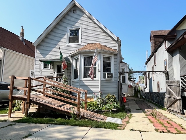 Much larger Victorian than it looks, 2 and a half baths, possible related living for extended family, side driveway, good yard space, handicap ramp built with the help of Chicago's first responders, 3 bedrooms, and parking for 3 cars in side drive, 1 car garage. Million Dollar homes around, make this your Million Dollar baby to call home. Bathroom on each level for your convenience, laundry on main floor, you can expand for more square footage. Home has alot of potential for the right investor.