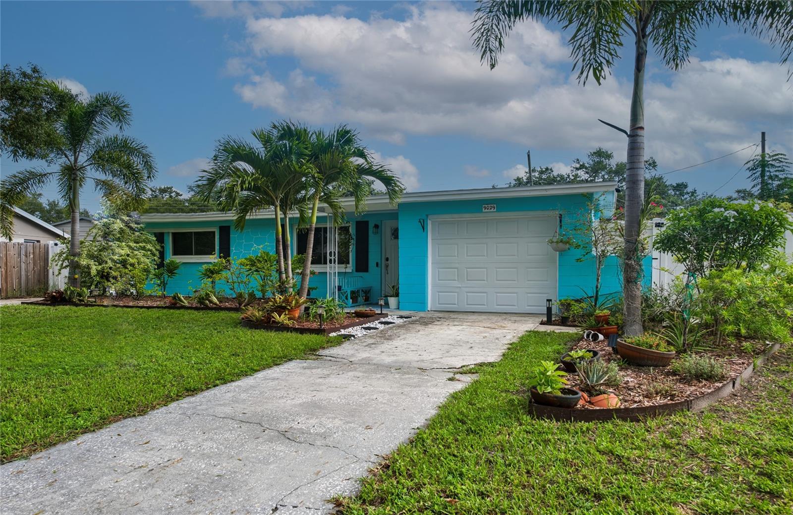 Are you ready to live the Florida lifestyle? This beautifully remodeled 3-bedroom, 2-bath, 1-car garage pool home offers modern updates, a desirable split-bedroom floor plan, and the perfect space to enjoy indoor and outdoor living.The spacious primary bedroom features an updated ensuite bathroom and a generous walk-in closet. Centrally located, the kitchen is designed for both everyday living and entertaining, with light and bright wood cabinetry, quartz countertops, and stainless-steel appliances. Both bathrooms have been tastefully updated, while luxury vinyl flooring and newer insulated double-pane windows add style and efficiency throughout the home.Step outside to your own private Florida retreat! A screened patio opens to an oversized backyard featuring a heated saltwater pool with a self-managed chemical system, a fire pit, and an oversized storage shed with electricity. The double driveway and double gate on the west side provide plenty of room for boat or RV parking.Major updates include a new water heater in 2026, AC in 2018, windows in 2022, new vinyl fence, and all-new plumbing completed in 2023/2024. Owner is offering new shingle roof with an acceptable offer. Centrally located and just minutes from the beautiful Gulf beaches, Tampa International Airport, shopping, dining, and everything the Florida lifestyle has to offer. This move-in-ready pool home has it all—come enjoy Florida living at its best!