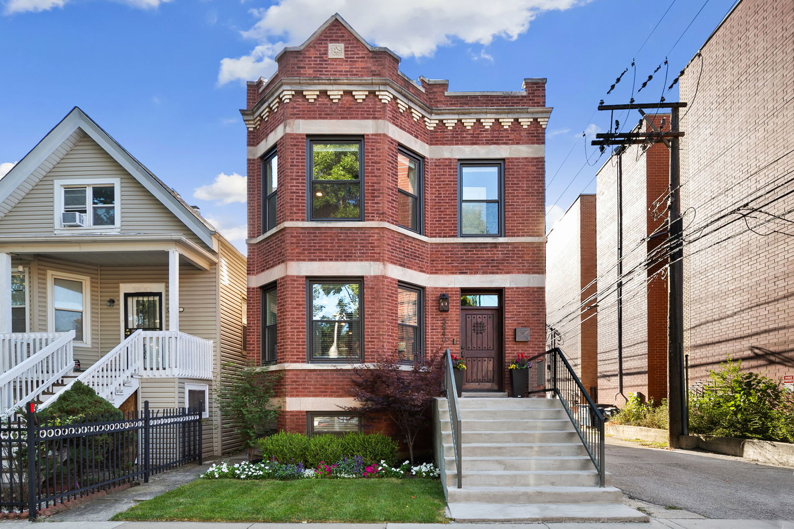 Step into this stunning all-brick, fully rehabbed home on a picturesque tree-lined street in the heart of Irving Park. The open floor plan features a chef's kitchen with a large island, 42" white cabinetry, marble countertops, stainless steel appliances, and a stylish backsplash that flows seamlessly into the living and dining areas with elegant coffered ceilings. Upstairs, the spacious primary suite boasts a custom walk-in closet and a spa-like bath with a walk-in shower, freestanding soaking tub, dual vanities, and heated floors. Two additional bedrooms and a full bathroom complete this level. The lower level offers a large recreation/family room, a full bathroom, and a fourth bedroom-perfect for guests, a home office or a gym. Enjoy the outdoors in your private urban oasis with a custom paver patio and beautifully landscaped yard. Additional highlights include a rare 3-car garage with side entrance and tall ceilings, deep casement window sills, a mudroom, dual-zone heating and cooling, second floor laundry plus hookups lower level and whole-home sound wiring. Unbeatable location with easy access to public transportation, highways, restaurants, shops, parks, and more!