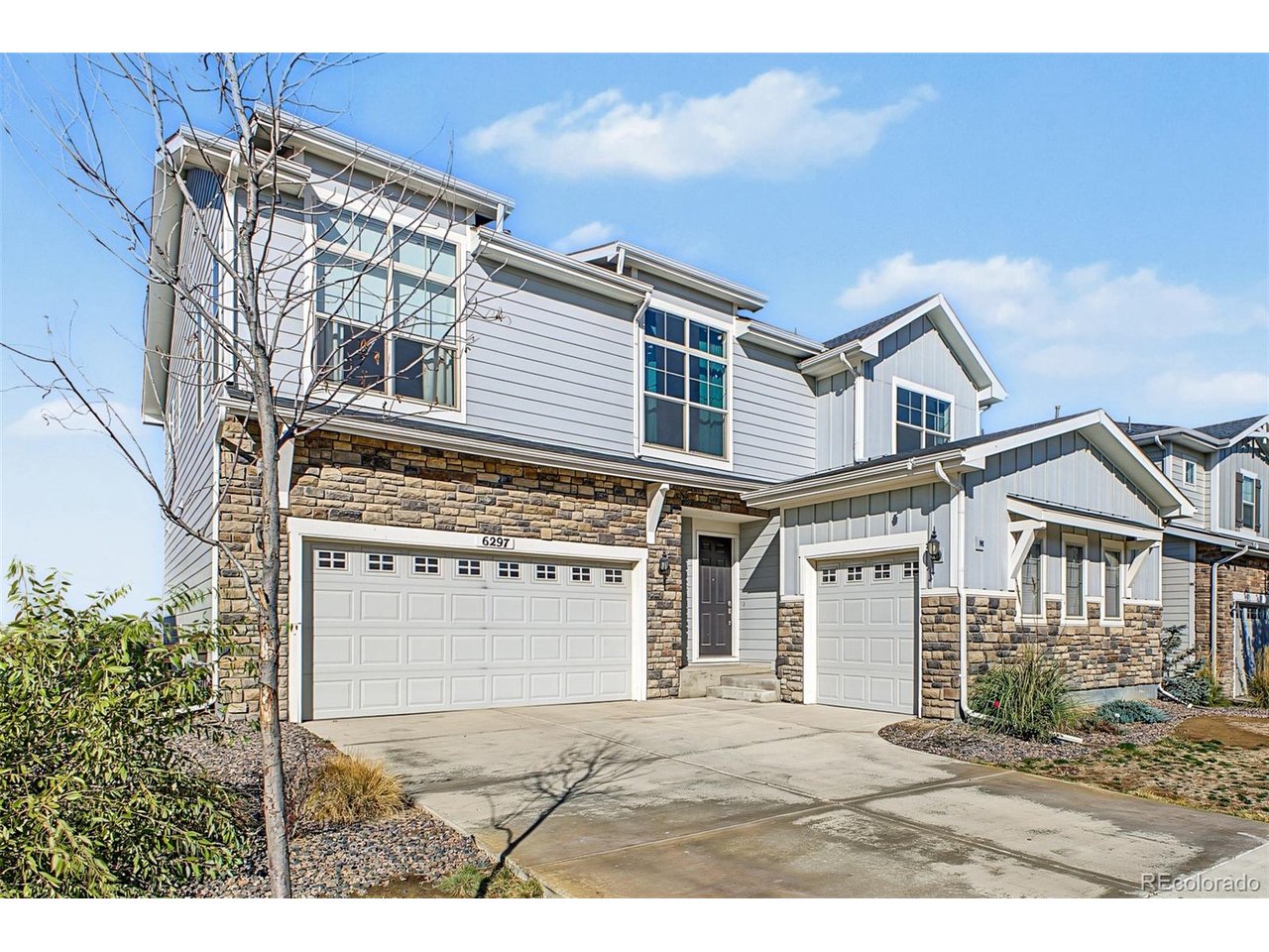 Welcome to this exceptionally upgraded home offering luxury, privacy, and breathtaking views of Longs Peak! Featuring a rare 4-foot structural foundation bump-out that expands the living space, this home is designed for comfort and entertaining. An impressive 16-foot sliding glass wall seamlessly connects the interior to a beautifully finished backyard with NO DIRECT REAR NEIGHBORS! Homes offering this level of privacy and mountain views rarely hit the market.The backyard is a true Colorado retreat, featuring low-maintenance xeriscaping, natural-looking artificial turf, a natural gas fire pit, and a patio equipped with electrical for a hot tub. A spacious side-yard dog run includes hot and cold-water connections for convenient pet washing.Inside, enjoy a gourmet chef's kitchen with stunning granite and quartz countertops, generous entertaining space, and built-in ceiling speakers throughout. Upstairs features four spacious bedrooms, including two connected by a Jack-and-Jill bathroom, a third with a private ensuite, and a luxurious primary suite with a beautiful bathroom and walk-in closet.The full-size unfinished basement offers endless possibilities, complete with bathroom rough-in plumbing and an egress window for a future bedroom, theater, gym, or additional living space.Two separate insulated garages, one two-car and one single-car, provide three garage spaces and ample storage. Enjoy exceptional community amenities, including a clubhouse, swimming pool, hot tub, and expansive neighborhood park.With extensive upgrades, rare backyard privacy, and spectacular Longs Peak views, this home delivers the ultimate Colorado lifestyle. Don't miss this exceptional opportunity!