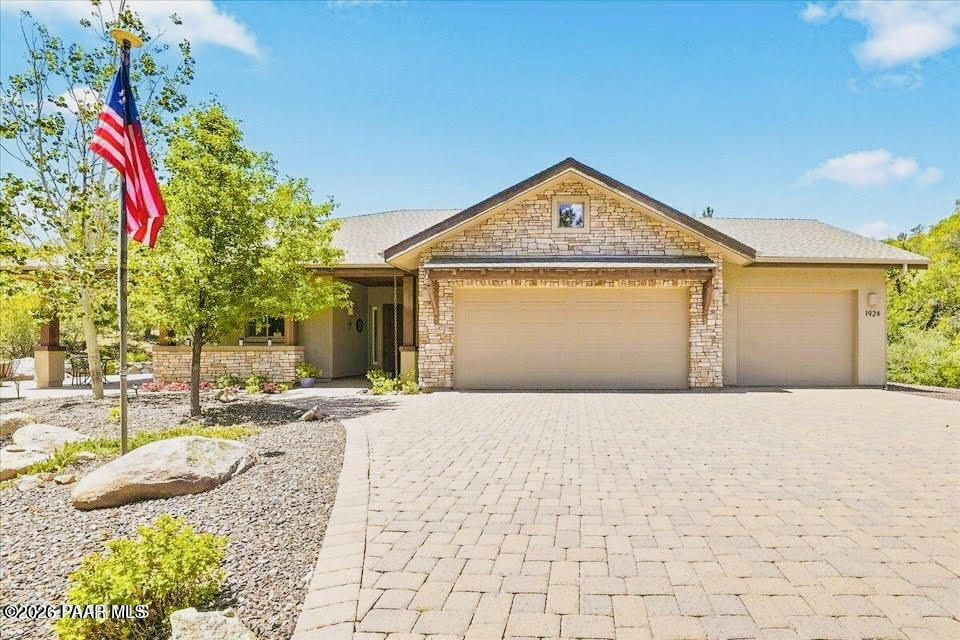 Part time buyer got cold feet, your opportunity now for this private Prescott retreat off of desired Williamson Valley Rd in the rarely available North Forty neighborhood!! Proudly offered by the original owners, this well maintained custom home is nestled within surrounding Native trees on 1.72 private acres and offers the perfect blend of comfort, quality craftsmanship, and thoughtful design. Enjoy the peace and privacy of a spacious homesite with room to relax, take in the surrounding scenery, and appreciate the area's mature trees and wildlife. Custom built in 2014 this 2,251 square foot single-level home features the convenience of city utilities, 3 bedrooms, 3 bathrooms, and an inviting open floor plan ideal for both everyday living and effortless entertaining. The open kitchen showcases beautiful natural cherry cabinetry with convenient pull-out drawers, an elegant African wood countertop island, and dual pantry spaces. The adjacent dining room features an attractive tray ceiling, while the living room is highlighted by its abundant natural light from the picturesque large windows, a cozy gas fireplace and a convenient floor outlet for flexible furniture placement. The primary suite is designed for comfort with a tray ceiling, separate his and her closets, and a spacious en-suite bath plus large walk-in shower. Two skylights fill the home with additional natural light and a whole house fan, a whole house fire sprinkler system and added extra ceiling insulation provide energy efficiency and peace of mind. Outdoor living is just as impressive, featuring a large front patio with a beautiful wood tongue and groove ceiling and a gas or wood burning fire pit, the perfect place to relax and enjoy Prescott's four season climate. The southeast-facing driveway offers favorable winter sun exposure, while two rain-harvesting systems, a water purification system, and a storage shed add ease to everyday functionality. The extended, oversized 4-car garage, complete with 18 foot and 10 foot wide garage doors, provides exceptional space for vehicles, hobbies, or storage. Surrounded by the natural beauty of Northern Arizona and conveniently located just minutes from the downtown Historic Prescott Courthouse Square, shopping, dining, medical facilities, and outdoor recreation, this exceptional property offers privacy, quality, and pride of ownership throughout. A rare opportunity to own a truly special home that has been lovingly cared for since day one.
