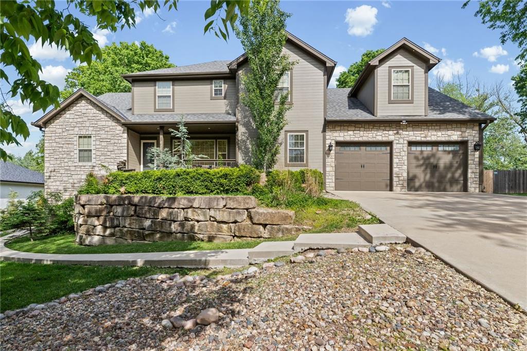 Beautifully updated 1.5-story lake home offering an elegant lifestyle in a peaceful, sought-after setting.  Meticulously maintained and thoughtfully improved 5-bed, 4 bath home features stunning updates throughout and inviting spaces designed for both everyday living and effortless entertaining.  The light-filled main level flows seamlessly with generous gathering areas that make hosting a breeze.  A fully finished lower level includes a complete second kitchen-ideal for guests, extended stays (secondary laundry to boot!), or entertaining on a grand scale.  Enjoy a private backyard retreat on a quiet street, just steps from convenient lake access.  A rare opportunity to own a refined, move-in-ready home that blends comfort, style, and location.  Start you lake living dreams today!