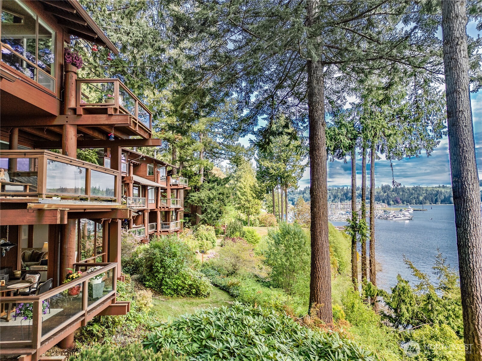 Beautiful ground flr condo on Port Ludlow Bay. Listen to the quiet lapping of the ripples on the bay while enjoying your beverage on the huge covered deck. This lovely condo has been updated and remodeled with lighting, hardwood & bamboo flrs, quartz countertops, newer appliances throughout kitchen, custom built ins and much more. It comes fully turnkey, with all the amenities you could want. Primary bedroom has a french door to the oversized deck. Watch the boats come in and out as you enjoy your deck. Heating lamp has been professionally installed for chilly nights. SELLER WILL CREDIT BUYER FOR BALANCE OF SPECIAL ASSESSMENT AT CLOSING.