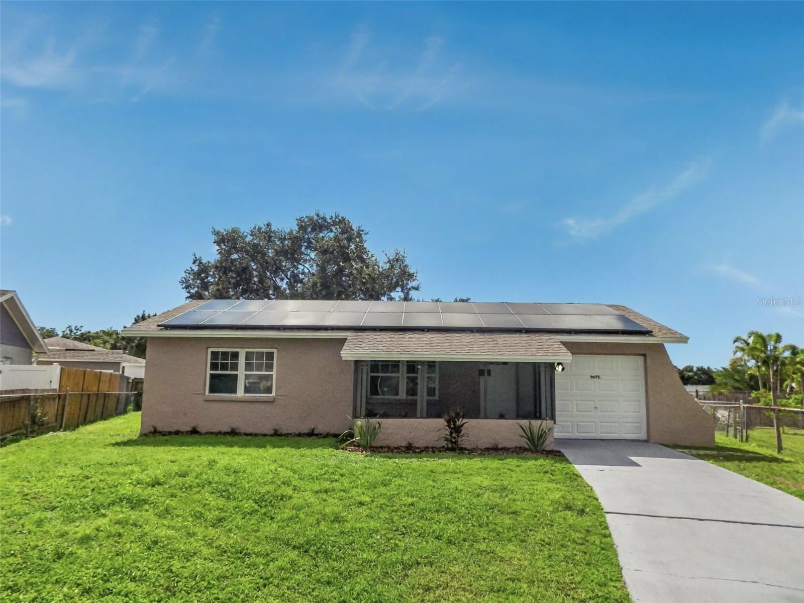 One or more photo(s) has been virtually staged. Welcome to 9970 62nd St N in Pinellas Park! This beautifully remodeled 2-bedroom, 1-bathroom home is tucked away on a quiet cul-de-sac and has modern updates throughout. Inside, you'll find a brand-new kitchen and bathroom, new flooring, fresh paint, and updated lighting. The kitchen comes fully equipped with new stainless steel appliances. One bedroom features dual closets and the second bedroom opens directly to the screened-in pool through sliding glass doors - perfect for enjoying indoor-outdoor living. Outside, you'll find a fenced-in backyard with an in-ground pool, along with a front screened-in lanai. Additional features include a one-car garage and energy-efficient solar panels. Make this move-in ready home yours - schedule your showing today!

Some photos in this listing have been virtually staged to help illustrate the property’s potential. No physical changes have been made to the property.