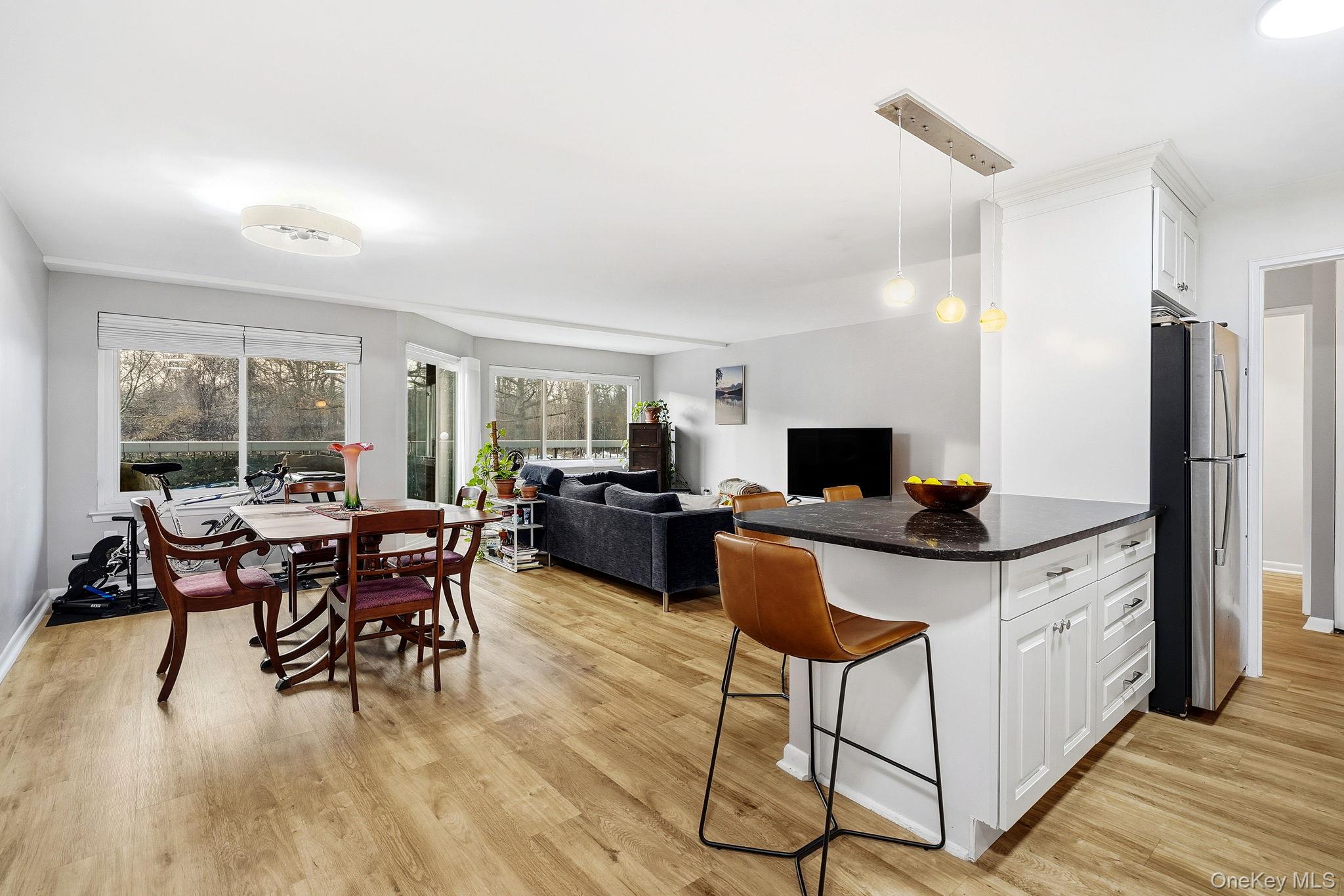 This 1-bedroom condo with a balcony is move-in-ready, with it's modern open concept living, dining, and kitchen area is perfect for entertaining. Laundry, trash, and private storage unit (~4x8ft) is all on the same floor. In the High Point of Hartsdale complex, you can enjoy the in-ground pool, gym, two saunas, kiddie playground, community club house, and full time security. Assigned parking included and ample guest parking.