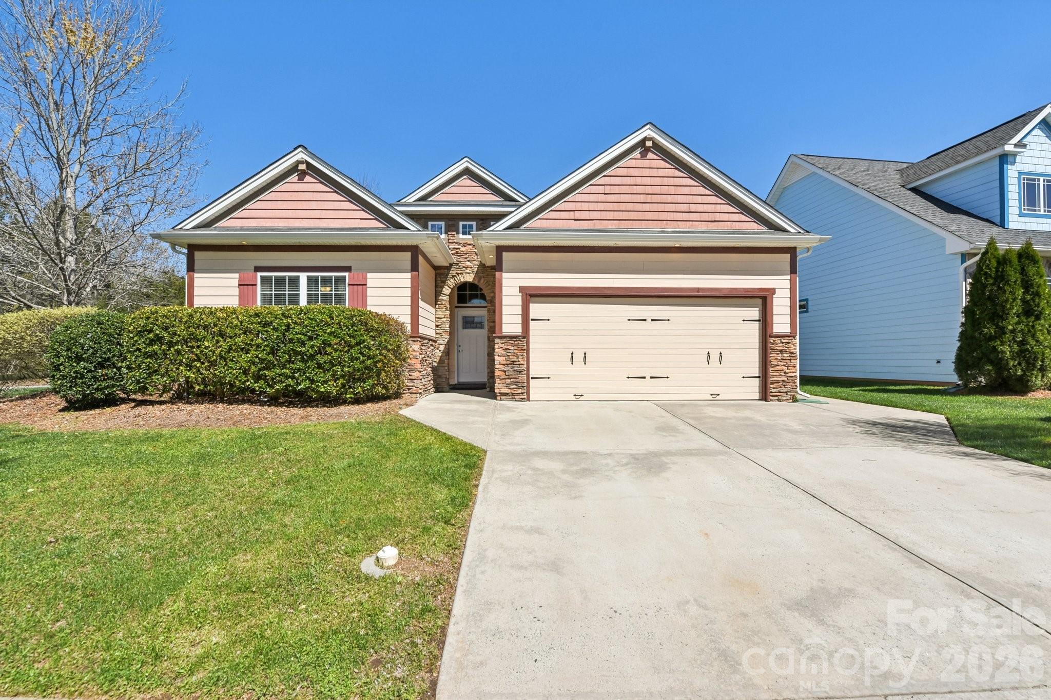 Beautifully maintained former model home offering the perfect blend of comfort, style, and functionality! This inviting one-story home with a spacious bonus room features a desirable split-bedroom floorplan, providing privacy and flexibility for everyday living. Warm wood floors flow through the main living areas, creating an elegant yet welcoming feel. The kitchen is a standout with rich cherry cabinetry, granite countertops, and ample workspace—perfect for both casual meals and entertaining. Custom center island ads an elegant touch! The updated primary bath offers a relaxing retreat with stylish finishes and tile flooring. Upstairs, the huge bonus room with built-in cabinets provides endless possibilities as a media room, game room, or additional living space—and the pool table stays! The garage has been thoughtfully converted into a functional workspace/office, perfect for remote work, hobbies, or a man cave. Enjoy the outdoors unwinding on the covered rear porch overlooking the fenced backyard—ideal for pets, play, or gatherings. Located in the highly convenient Eastfield Road area of Charlotte, you’ll love being just minutes from a variety of shopping, dining, and everyday amenities, with easy access to major roadways for commuting. This home truly offers versatility, comfort, and a fantastic location—don’t miss it!