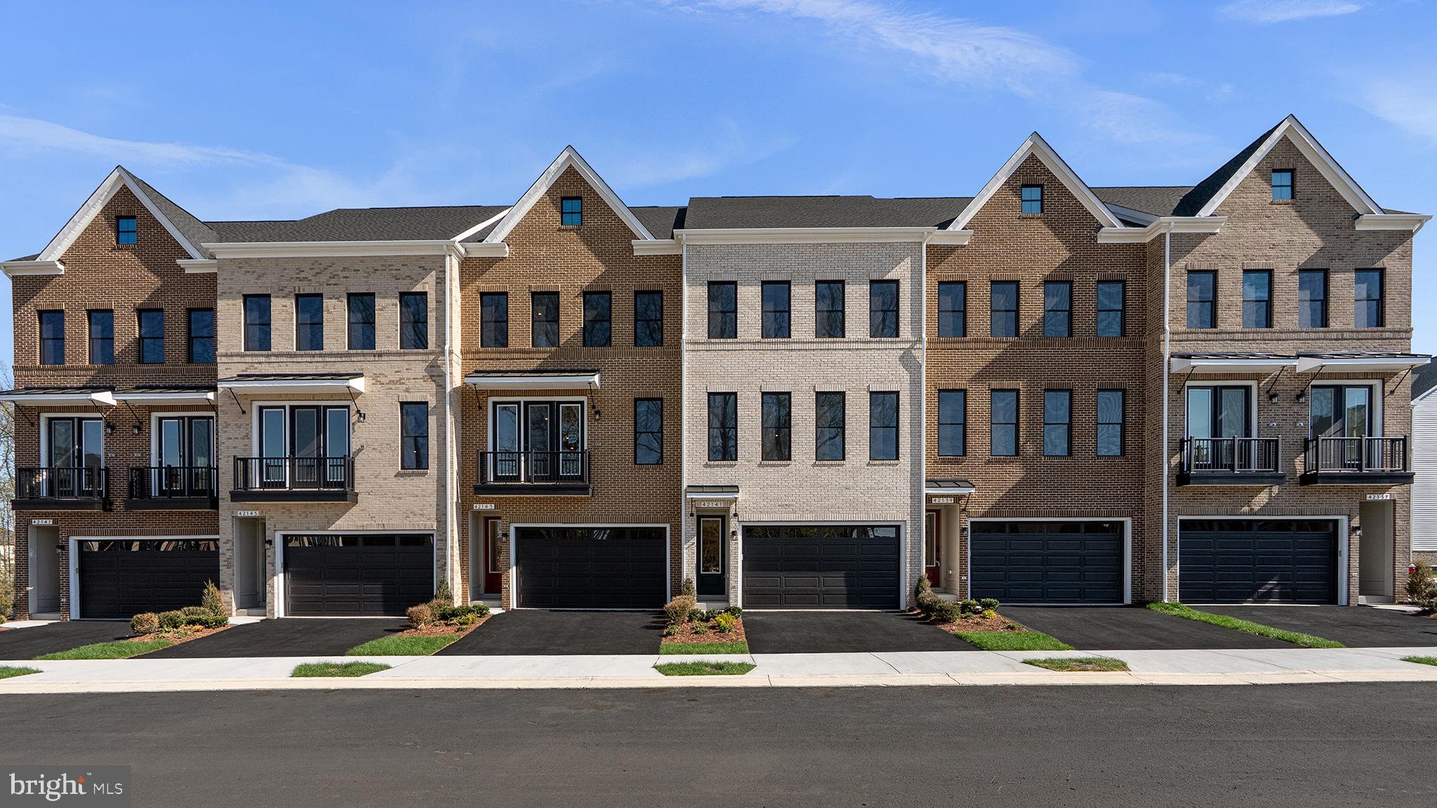 Discover brand NEW buildable TOWNHOMES with personalization options by Van Metre Homes at West Park III in Brambleton, VA. Ready for you to move in EARLY 2027 based on build time. Step into the Turner 22-F2-RT at West Park III—a two-car, front-load garage townhome with up to four bedrooms, up to three full bathrooms, and up to three half bathrooms. Built for flexibility and function, this floorplan offers a rec room or lower-level multi-gen suite, the choice is yours! Additionally, the home is complete with a cafe/breakfast area on the main level, a loft for entertaining, and seamless outdoor living with a deck and roof terrace—making room for every moment, indoors and out. The Turner 22-F2-RT offers build-to-order opportunities on select homesites, allowing you to personalize your new home. Explore a variety of professionally curated interior design packages at different price points to match your style and budget. Certain homesites also offer optional structural enhancements. Contact a Van Metre Sales Advisor to learn how you can bring your vision to life! Being a new build, your home is constructed to the highest energy efficiency standards, comes with a post-settlement warranty, and has never been lived in before! Take advantage of closing cost assistance by choosing Intercoastal Mortgage and Walker Title. Self-schedule a tour or explore your options by visiting our website or get in contact with a Van Metre Sales Advisor for more details!-----NterNow self-touring is available on select homesites at West Park III, no agent or appointment required. Buyers may visit independently during daylight hours. For access instructions and availability, contact Van Metre Homes directly or visit our website.-----Welcome to West Park III, a vibrant neighborhood of dreamy townhomes with rooftop terrace options in the award-winning community of Brambleton, VA. Experience an exceptional living experience in Brambleton, a flourishing community where modern living meets suburban charm. This family-friendly community offers miles of trails, tot lots, parks, pools, highly sought-after schools within walking distance, and so much more at your fingertips. With the bustling Brambleton Town Center just down the street, you can enjoy endless shopping, dining, and entertainment options. Rise to new heights at West Park III and experience the perfect blend of comfort, convenience, and connectivity—a place where cloud nine is just the beginning. -----*Other homes sites and delivery dates may be available. Pricing, offers, and availability are subject to change without notice. Images, renderings, and site plans are for illustrative purposes only and may not reflect actual homes or features. Some images and renderings may depict interior designs created in collaboration with AI or may represent a similar home. Additional terms and conditions may apply. West Park III lies within the Airport Impact Overlay District (entirely within 1 Mile Buffer). Due to its proximity to Dulles International Airport, this site is subject to aircraft overflights and aircraft noise. Please see a Van Metre Sales Advisor for details