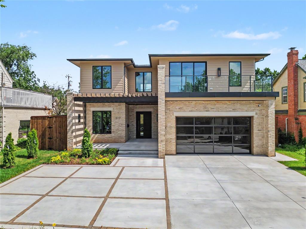 Just completed, this striking contemporary residence is a true architectural statement, blending sophisticated design with exceptional craftsmanship. From the moment you enter, you're greeted by a dramatic two story living space wrapped in windows that flood the home with natural light and create an extraordinary sense of openness.Designed for both everyday living and elegant entertaining, the open-concept floor plan features a stunning custom kitchen with designer finishes, an oversized island, butler's pantry with hidden storage, custom bar area, and seamless flow into the main living spaces.The luxurious primary suite is privately situated on the main level and offers a true retreat with direct access to the backyard oasis. The spa inspired bath showcases a soaking tub, oversized shower, dual circular vanities, custom cabinetry, and an impressive walk-in closet. A second main-level bedroom with a private ensuite bath provides ideal accommodations for guests or multigenerational living.Upstairs, a spacious secondary living area overlooks the dramatic great room below and is accompanied by two additional ensuite bedrooms, each thoughtfully designed with privacy and comfort in mind. A distinctive office space upstairs offers the perfect work from home environment, while one of the upstairs bedrooms enjoys access to a private glass balcony, creating a unique indoor-outdoor experience.Outside, the resort-style backyard is centered around a sparkling pool and an inviting covered patio complete with a fireplace, offering the perfect setting for year-round entertaining and relaxation.An exceptional blend of contemporary architecture, luxury finishes, and thoughtful design, this newly completed residence delivers a lifestyle as impressive as its design.