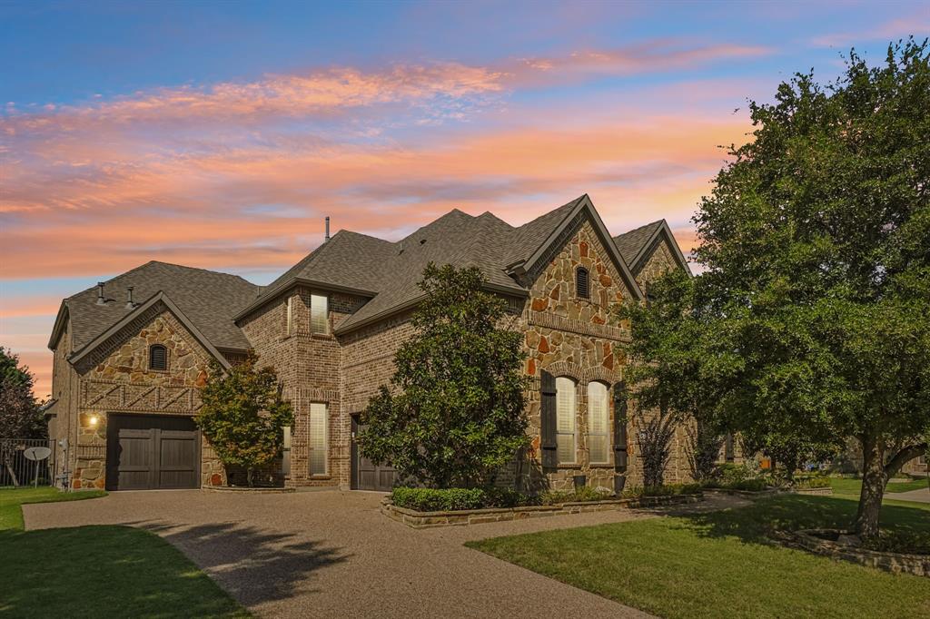 Offer accepted Feb 13th, Open House Cancelled Feb 14th!! Stunning 4-bedroom home with 3 full and 2 half baths in the heart of Trophy Club! Step inside to an open entry with a sweeping staircase and formal dining room, perfect for entertaining. Soaring ceilings, wood flooring and custom window shutters enhance the home's timeless elegance. The living room impresses with a floor-to-ceiling stone fireplace and a wall of windows that fill the space with natural light. The chef’s kitchen offers custom two-tone cabinetry, a gas cooktop, an oversized island with pendant lighting, and beautiful finishes. The primary suite is a true retreat featuring dual vanities with granite counters, a walk-in shower with dual shower heads, a soaking tub, and a spacious walk-in closet. A downstairs executive study provides the perfect work-from-home space, while a guest bedroom offers comfort and privacy. Upstairs is designed for fun, with a large game room with built-in desk and a media room. Two additional bedrooms share a Jack-and-Jill bath. Step outside to enjoy the covered patio featuring an outdoor kitchen and pergola with outdoor fireplace - the perfect place to entertain! A 3-car split garage completes this exceptional home. Located in Trophy Club—consistently ranked among the safest cities in Texas—you’ll enjoy proximity to top-rated schools, shopping, dining, and entertainment. Schedule your showing today!