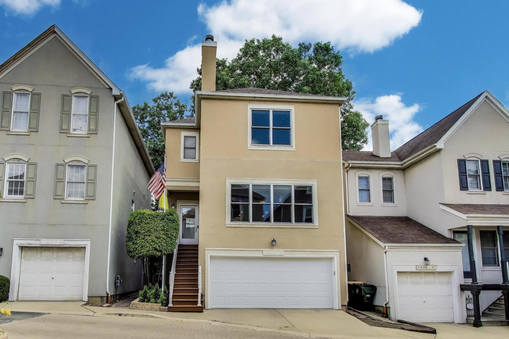 Discover luxury living in this stunning 3-bedroom, 3-bathroom single-family home tucked inside the exclusive gated community of Picardy Place in coveted Lincoln Park! Set within a close-knit neighborhood known for block parties and friendly gatherings, this residence combines privacy, modern elegance, and thoughtful updates with all the conveniences of city living.  Completely renovated in 2018 and meticulously maintained, the home features freshly refinished hardwood floors (2025), refinished stairs and balcony (2025), and a fully renovated primary bathroom (2024). Main level showcases an impressive open-concept layout where living, dining, and kitchen spaces flow seamlessly together. Anchored by a striking white fireplace with dark mantle, the living room is framed by built-in shelving and bathed in natural light. The custom kitchen boasts white shaker cabinetry with glass inserts, pristine quartz countertops, premium stainless steel appliances, and a large waterfall-edge island with breakfast bar seating-perfect for entertaining. The adjacent breakfast nook opens to a private balcony ideal for BBQs and relaxing. Upstairs, the luxurious primary suite delights with a tray ceiling, hardwood floors, walk-in closet, and spa-inspired en-suite with double vanities, glass shower, and custom tile. A second bedroom and modern hall bath with double sinks complete this level, along with a laundry room and Elfa closet systems for exceptional storage. The lower level offers flexible living as a third bedroom or family room with its own full bathroom and walkout access to the fully hardscaped backyard-featuring new brick pavers, raised garden beds, mature treescape, and plenty of birds and furry visitors. Additional highlights include a private two-car garage (rare in the city!) with new garage door and lift system ) plus recent weatherstripping (2025), regular HVAC and dryer duct cleanings, and a front garden bed redone in 2023. With extremely low HOA dues and flexible regulations, the community offers peace of mind without restrictive oversight. Perfectly positioned near Chi Che Wang Park, Hamlin Park, Lincoln Park Zoo, North Avenue Beach, and endless shopping and dining options-including Chicago Pizza & Oven Grinder and Michelin-starred Alinea-this home also provides easy access to highways, CTA bus lines, and the Fullerton Red/Brown Line station. Luxury, location, and lifestyle converge in this move-in-ready Lincoln Park gem-schedule your private showing today!