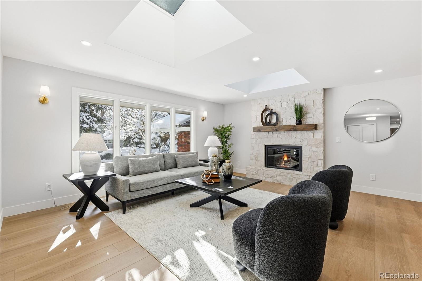 Set on a quiet cul-de-sac in the coveted Gunbarrel Green neighborhood, this sprawling ranch-style home has been fully and professionally remodeled to perfection. This 4-bedroom, 4-bathroom residence offers effortless main-level living with an open floorplan and high-end finishes throughout.The heart of the home is the reimagined gourmet kitchen, featuring a large center island, pantry, quartz countertops, and a full suite of stainless steel appliances. The kitchen seamlessly flows into the living room, which is accented by skylights, and a gas fireplace, creating an ideal space for entertaining or quiet relaxation.The main level includes a generous primary suite with walk-in closet and a spa-like ensuite bath with dual vanities and a large walk-in shower/tub wet room. A finished lower level provides a versatile family/rec room, a fourth bedroom, a full bath, and ample storage, offering plenty of room to spread out.Enjoy the expansive, park-like backyard with mature landscaping and a deck, perfect for indoor-outdoor Colorado living. With convenient access to the Boulder Country Club, extensive trails, shops, and top-rated Boulder Valley Schools (Fairview & Boulder High options), this is a rare opportunity to call a truly turn-key property home.