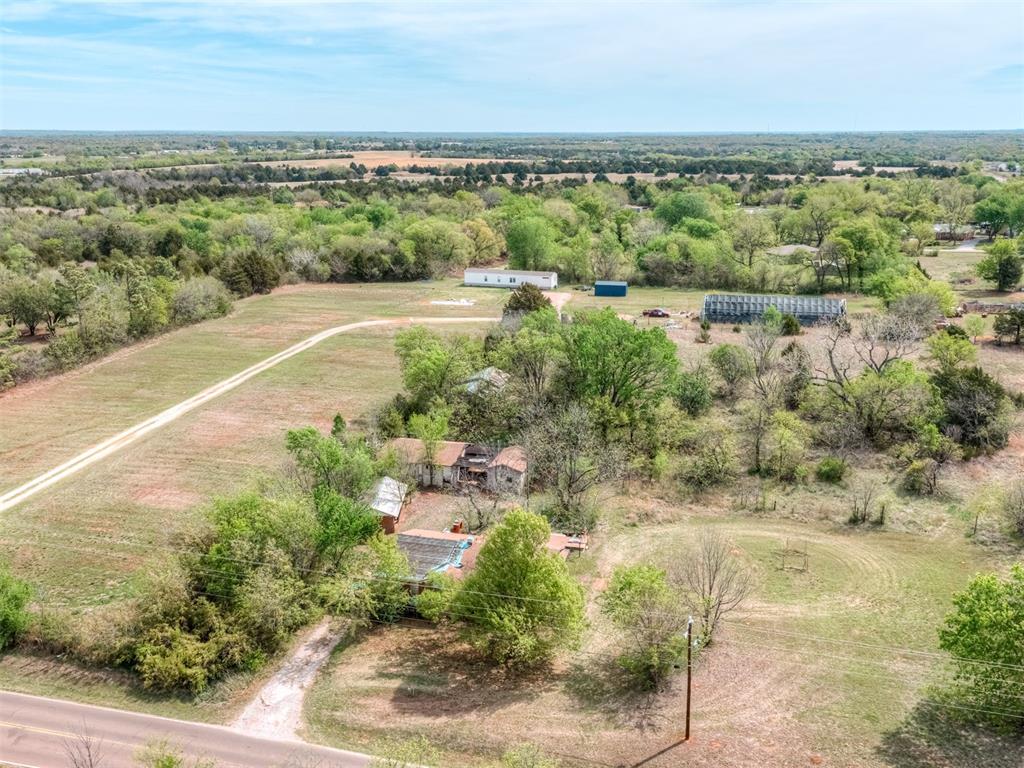 6.16 Acres Near OU & Lake Thunderbird | Corner Property with Space & PotentialSituated at the corner of Alameda & 36th Ave NE, this unique property offers a rare opportunity to own land with space, flexibility, and a highly convenient location. Just minutes from the University of Oklahoma, I-35, and central Norman, with a direct route to Lake Thunderbird, this setting provides both accessibility and room to grow.The property includes two homes along with several additional outbuildings, offering a variety of possibilities for future use. Whether you’re looking for space to create something new, hold as an investment, or explore long-term potential, this property presents a compelling opportunity.With approximately 417 feet of frontage along Alameda and a desirable corner layout, the property offers strong visibility and access. The area continues to see ongoing growth, including nearby development activity, adding to the long-term appeal.Enjoy being approximately 10 minutes from Lake Thunderbird, making it easy to take advantage of outdoor recreation while still being close to everyday conveniences, shopping, dining, and campus life.Two homes are located on the property. Structures are present but are in distressed condition—do not enter. Access will be granted to serious buyers upon request.Property is being sold as-is and value is in the land. Buyers are encouraged to verify all information, including zoning, utilities, and future use possibilities with the City of Norman. Please call with any questions.