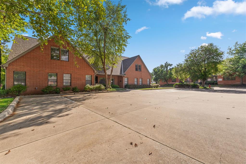 Prime commercial office property in East Edmond! Incredibly spacious and SECURE building/electronic entrance; with secure electronic entrance to all office spaces once inside. This immaculate commercial space offers a prestigious address in the vibrant heart of desirable east Edmond. The HOA is responsible for maintaining the beautiful grass areas and other landscaping throughout the park. Lower level is ADA accessible with Men's and Women's ADA restrooms. Kitchen area on 2nd floor, sink/kitchenette area on 1st floor. PLENTY of storage space throughout the building for each tenant. There is plenty of parking on all sides of the building. Easy access in and out of the building and close to major highway/I35 (1.7 miles). Highly concentrated area surrounded by retail, medical, restaurants, and residential