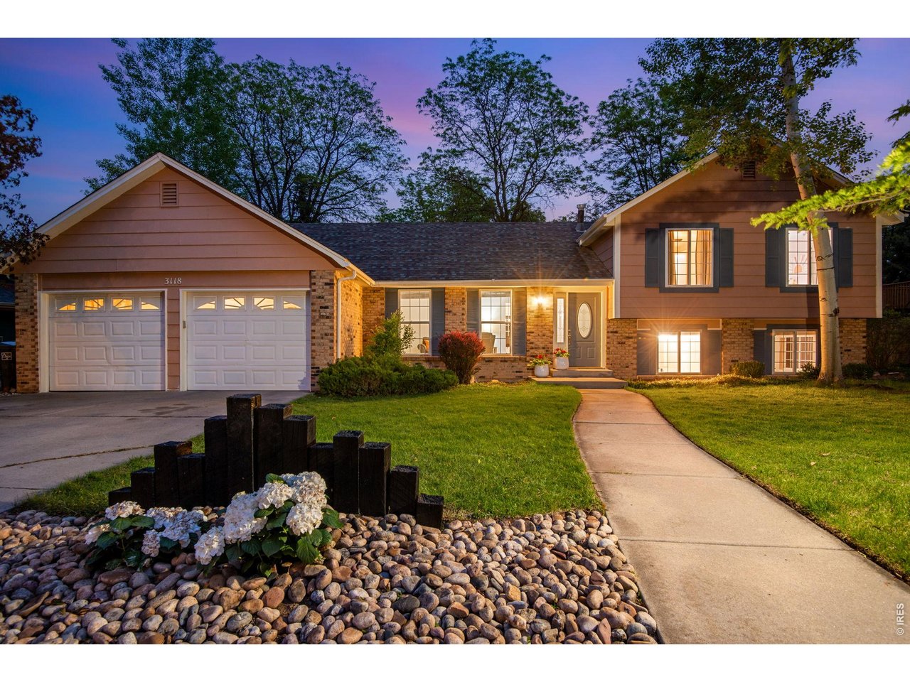 Open House Sat 5/30 & Sun 5/31 12-3pm. NO HOA. NO METRO TAX. Nearly completely remodeled in 2025-2026, this beautifully updated home is located in Northwest Loveland just west of The Old Course golf community and near the foothills of the Colorado Rockies. Enjoy easy access to shopping, dining, parks, trails, golf, grocery stores and entertainment while living minutes from Estes Park and Rocky Mountain National Park. Loveland is consistently ranked as one of the best places to live in America. Allergy concerns? Sellers are non-smokers with no pets. Interior features include new LVP flooring, upgraded carpet and padding, white trim, new interior paint, double pane vinyl windows with blinds included, spacious foyer with double-wide coat closet, vaulted ceilings with decorative center truss, large dining area, cozy kitchen with stainless steel appliances, pantry, crown molding, abundant Hickory cabinetry and counters-pace, plus a family room with exposed trusses, wood burning fireplace and brick surround. Updated baths feature quartz countertops and soft-close toilets. Spacious lower-level recreation room with can lighting is ideal for a home office or flex space. Upstairs offers a primary suite with retreat and private bath plus additional bedrooms with ceiling fans. Basement includes 7'6" ceilings and a large storage room. Major upgrades include a 2025 Lennox furnace, central A/C, active radon system and included washer and dryer. Oversized insulated and drywalled 2-car garage with keyless entry, cabinets and attic access. Situated on a .20-acre lot (which can easily be fenced) with mature landscaping, sprinkler and drip system, covered patio with oversized concrete pad, west-facing front for natural snowmelt and sunsets, east-facing backyard for summer shade, plus nearby fire hydrant for potential insurance savings. Contact broker via email for floor plan, full feature list or private showing information.